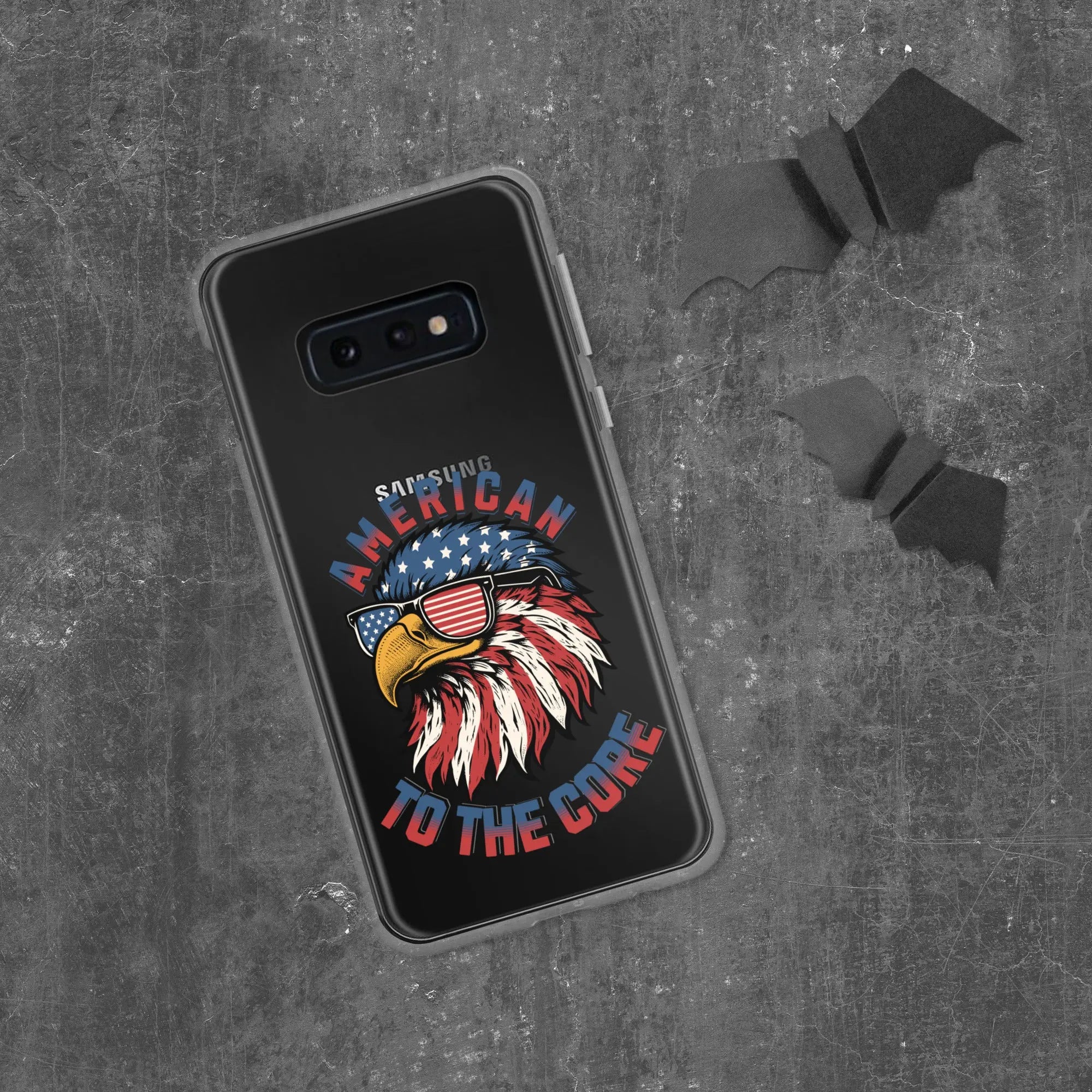 A patriotic Samsung phone clear case with an eagle head and the text "American To The Core."
