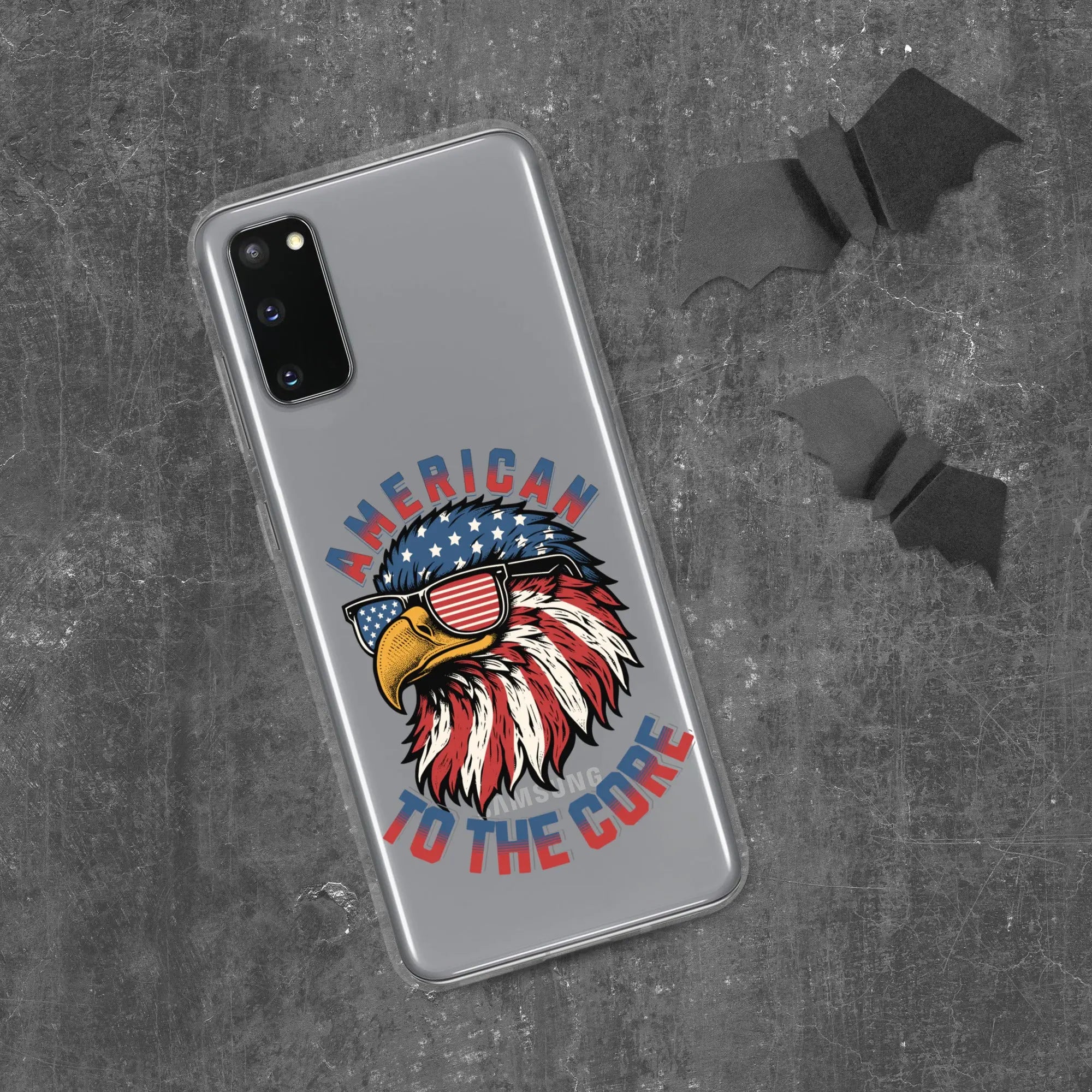A patriotic Samsung phone clear case with an eagle head and the text "American To The Core."