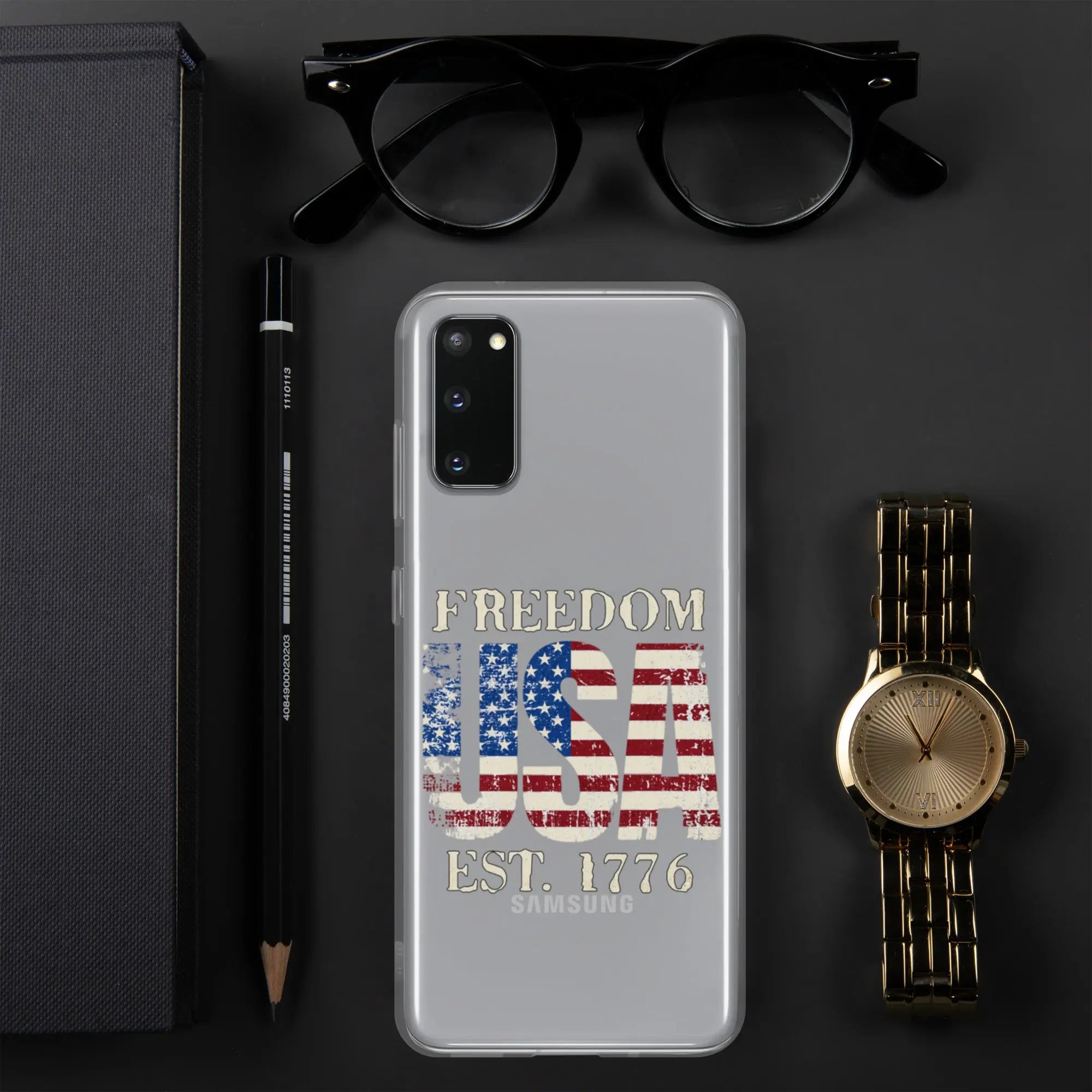 A patriotic Samsung clear phone case with the American flag in the shape of the USA and the text "Freedom est. 1776."