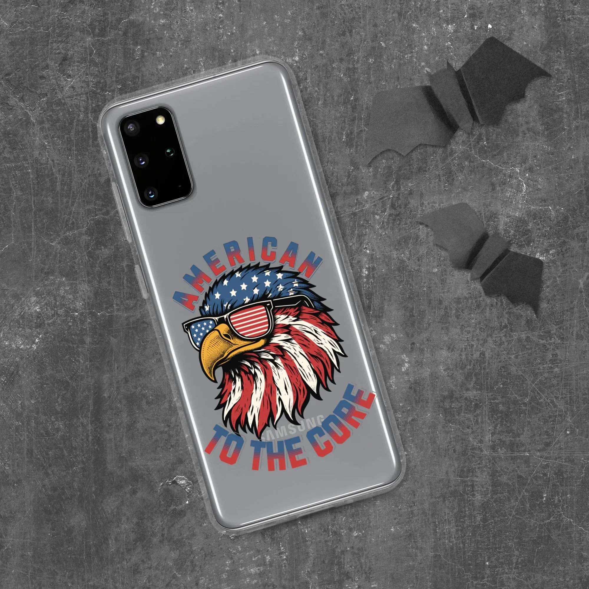 A patriotic Samsung phone clear case with an eagle head and the text "American To The Core."