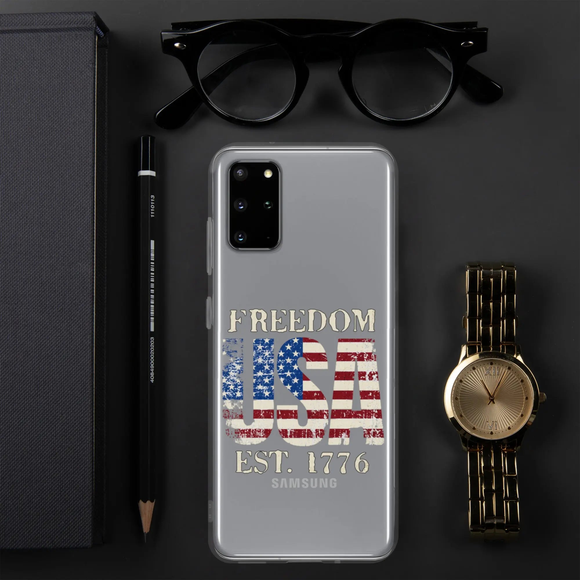 A patriotic Samsung clear phone case with the American flag in the shape of the USA and the text "Freedom est. 1776."