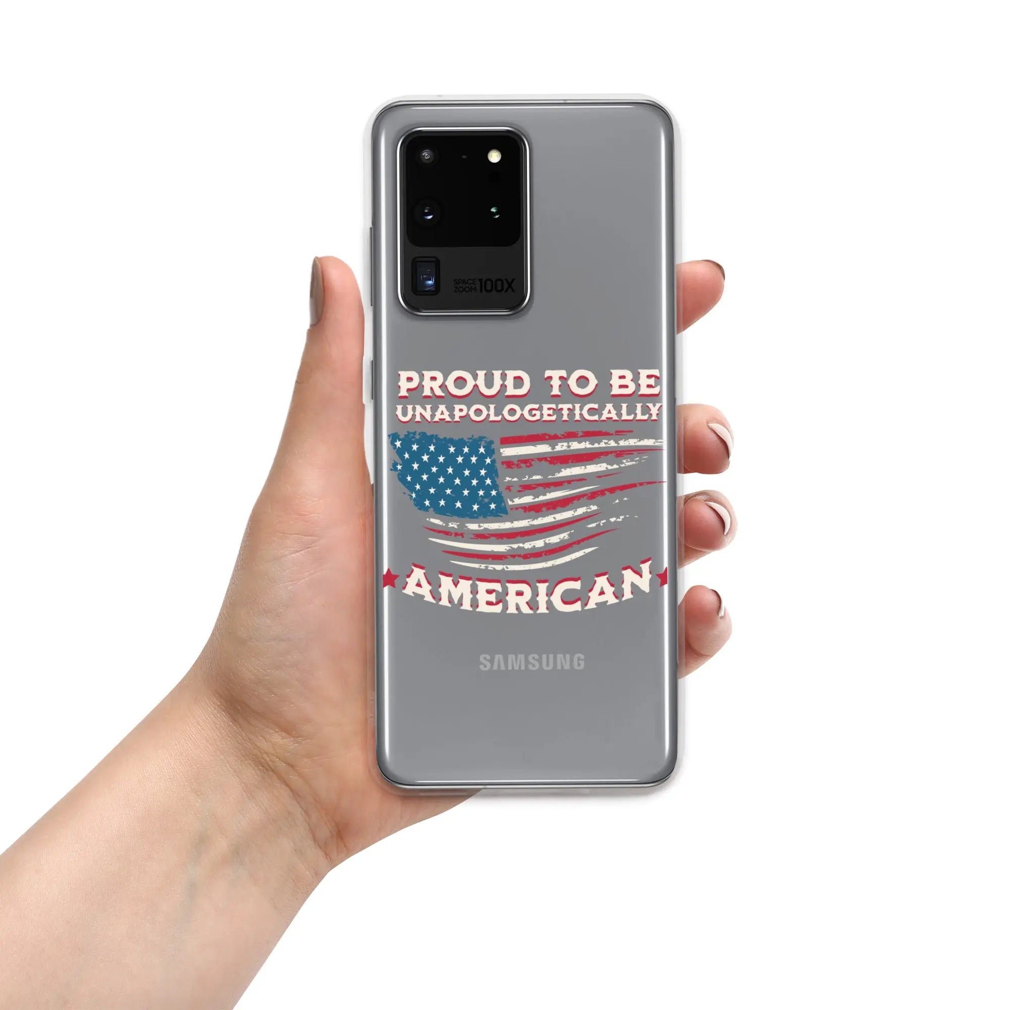 A patriotic Samsung phone clear case with an American flag and the text "Proud To Be Unapologetically American."