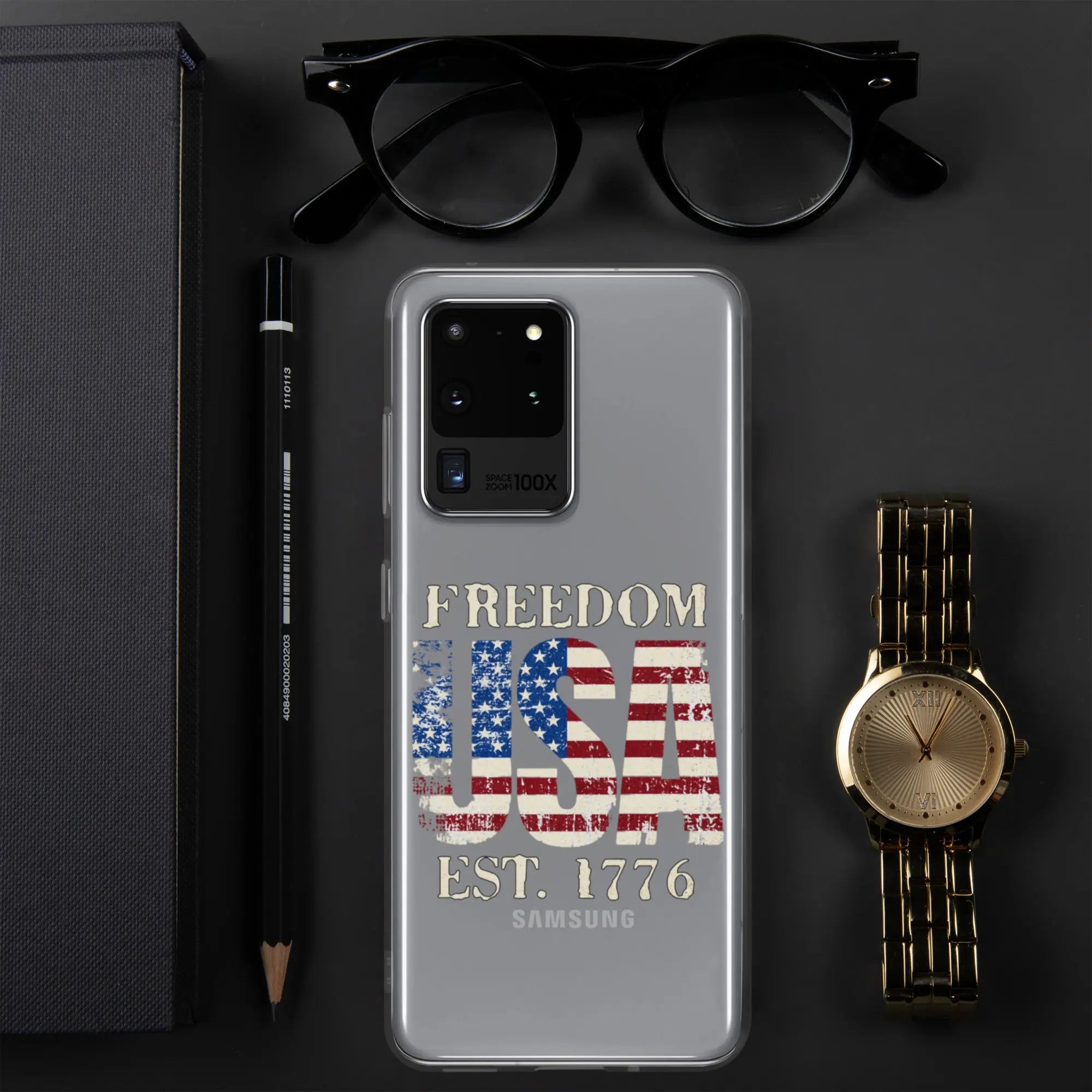 A patriotic Samsung clear phone case with the American flag in the shape of the USA and the text "Freedom est. 1776."