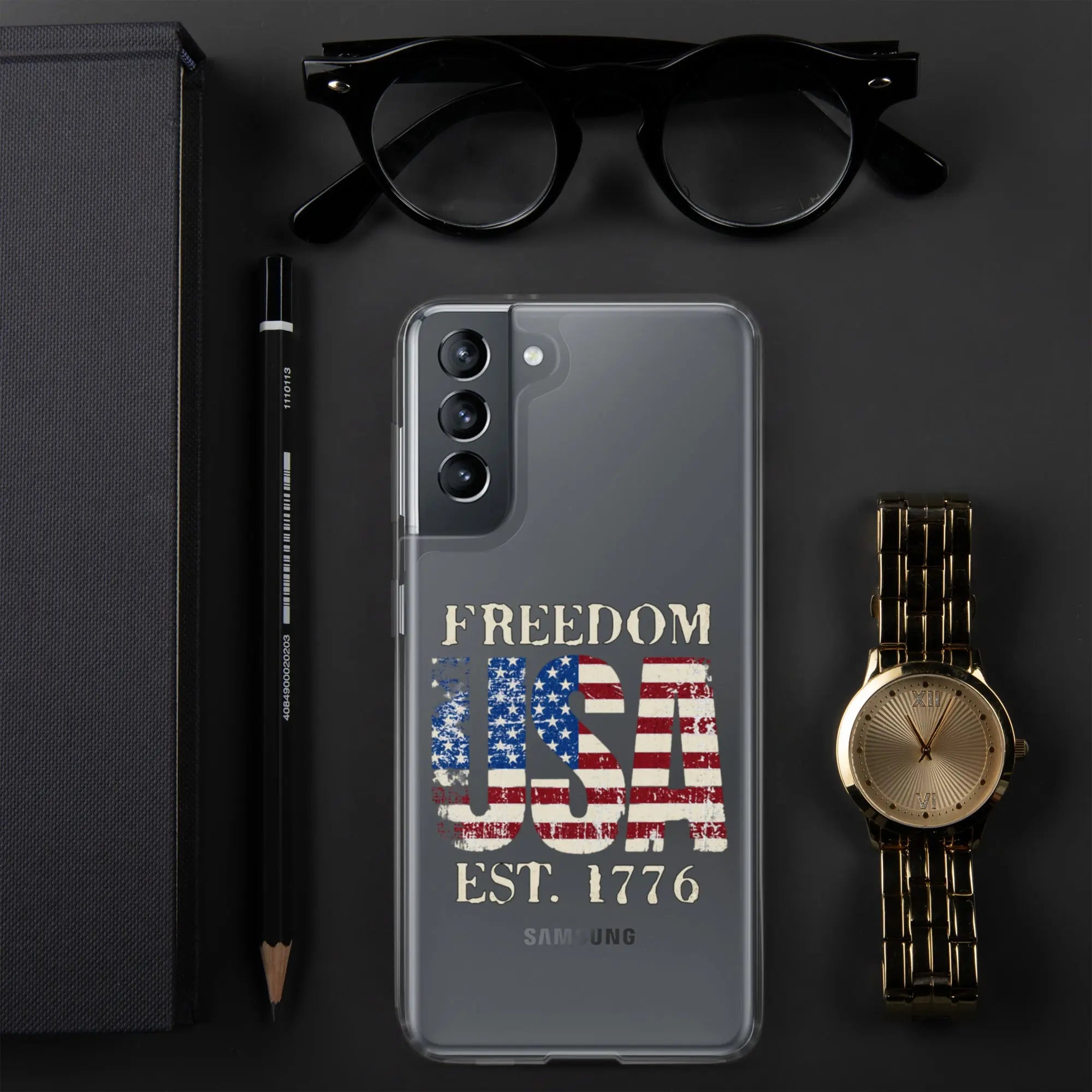 A patriotic Samsung clear phone case with the American flag in the shape of the USA and the text "Freedom est. 1776."