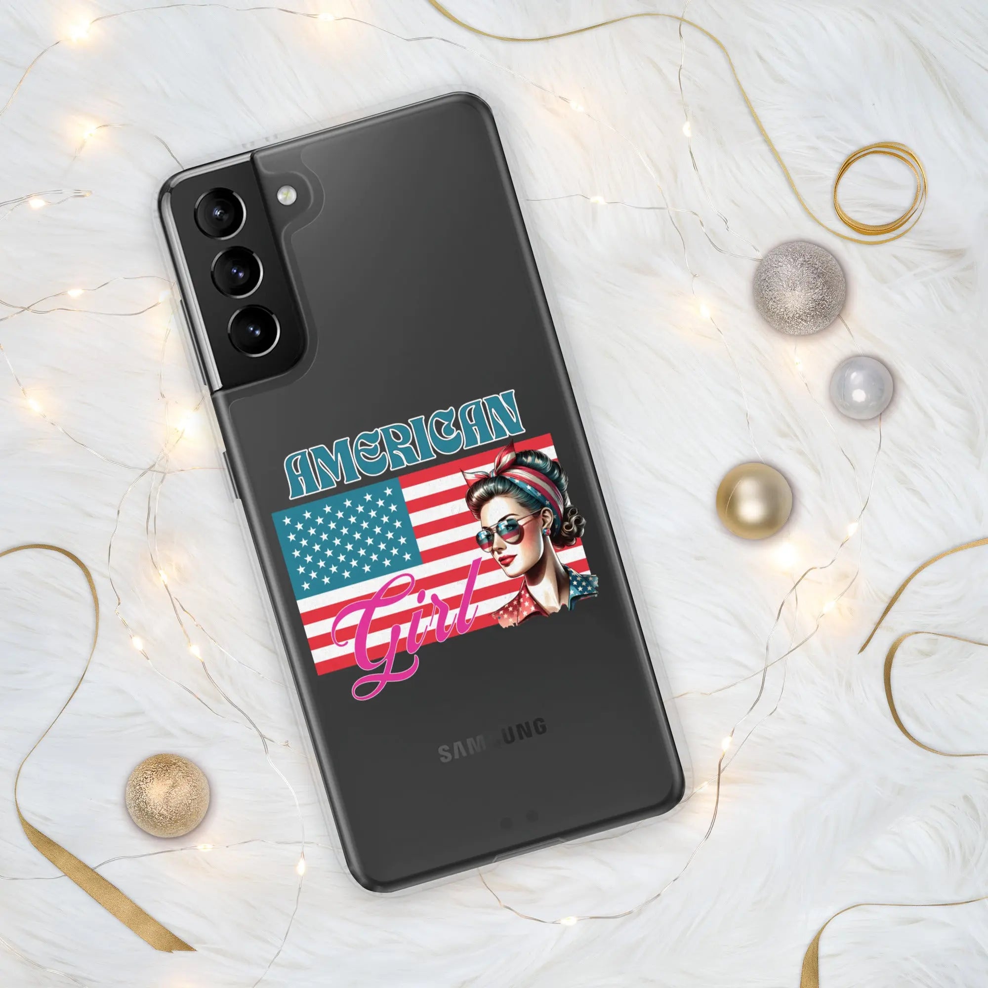 A patriotic Samsung phone clear case with the American flag and a woman's head on it and the text "American Girl."