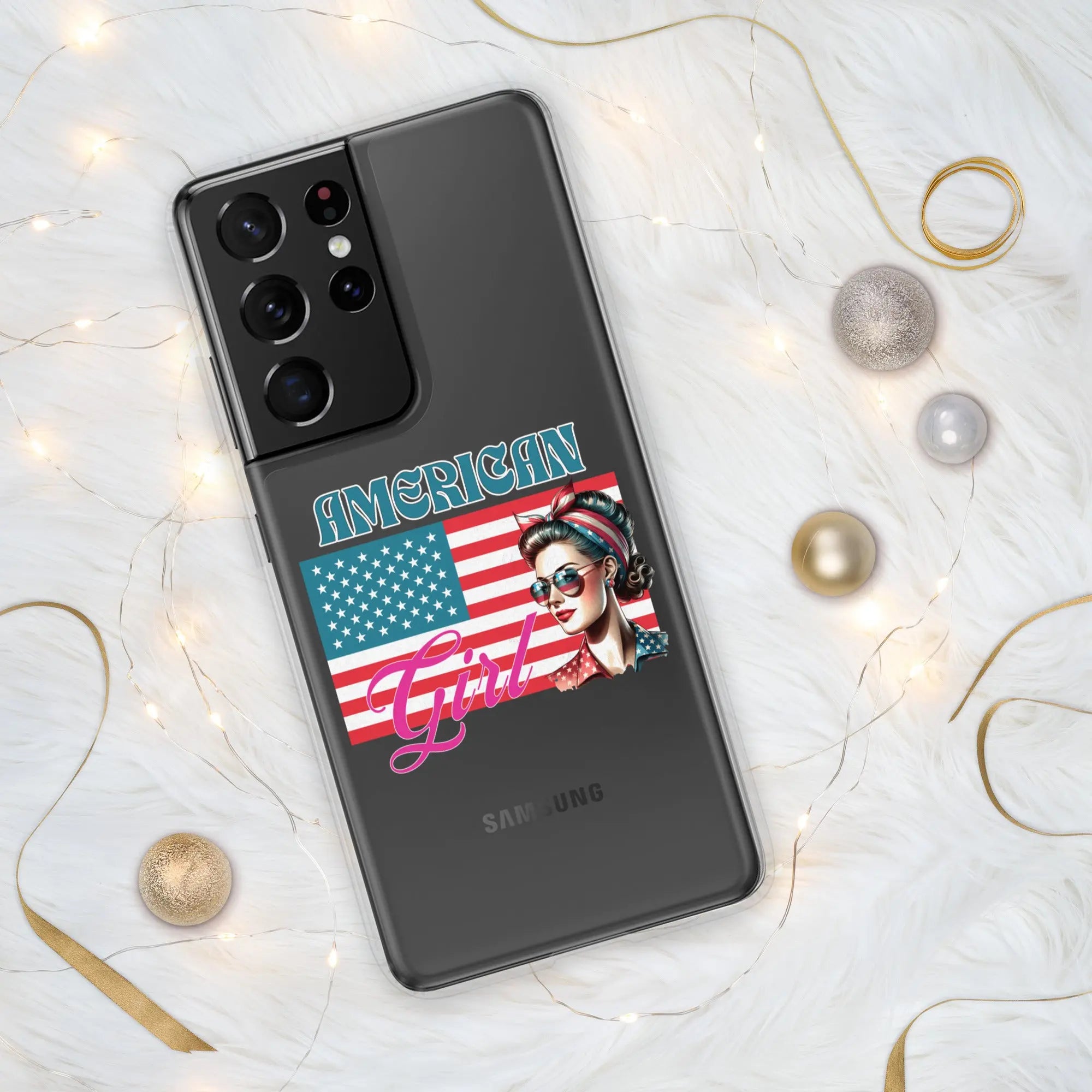 A patriotic Samsung phone clear case with the American flag and a woman's head on it and the text "American Girl."
