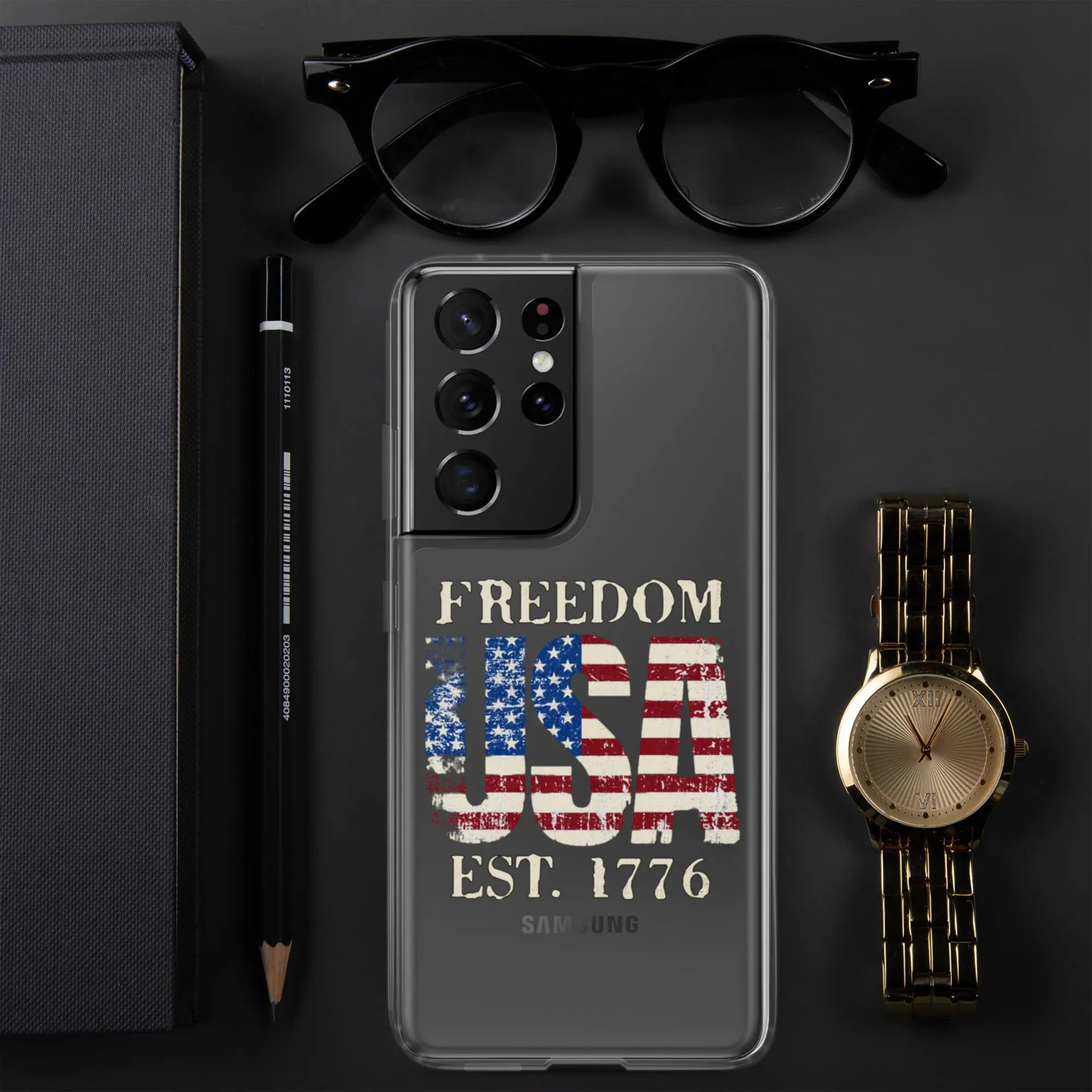 A patriotic Samsung clear phone case with the American flag in the shape of the USA and the text "Freedom est. 1776."