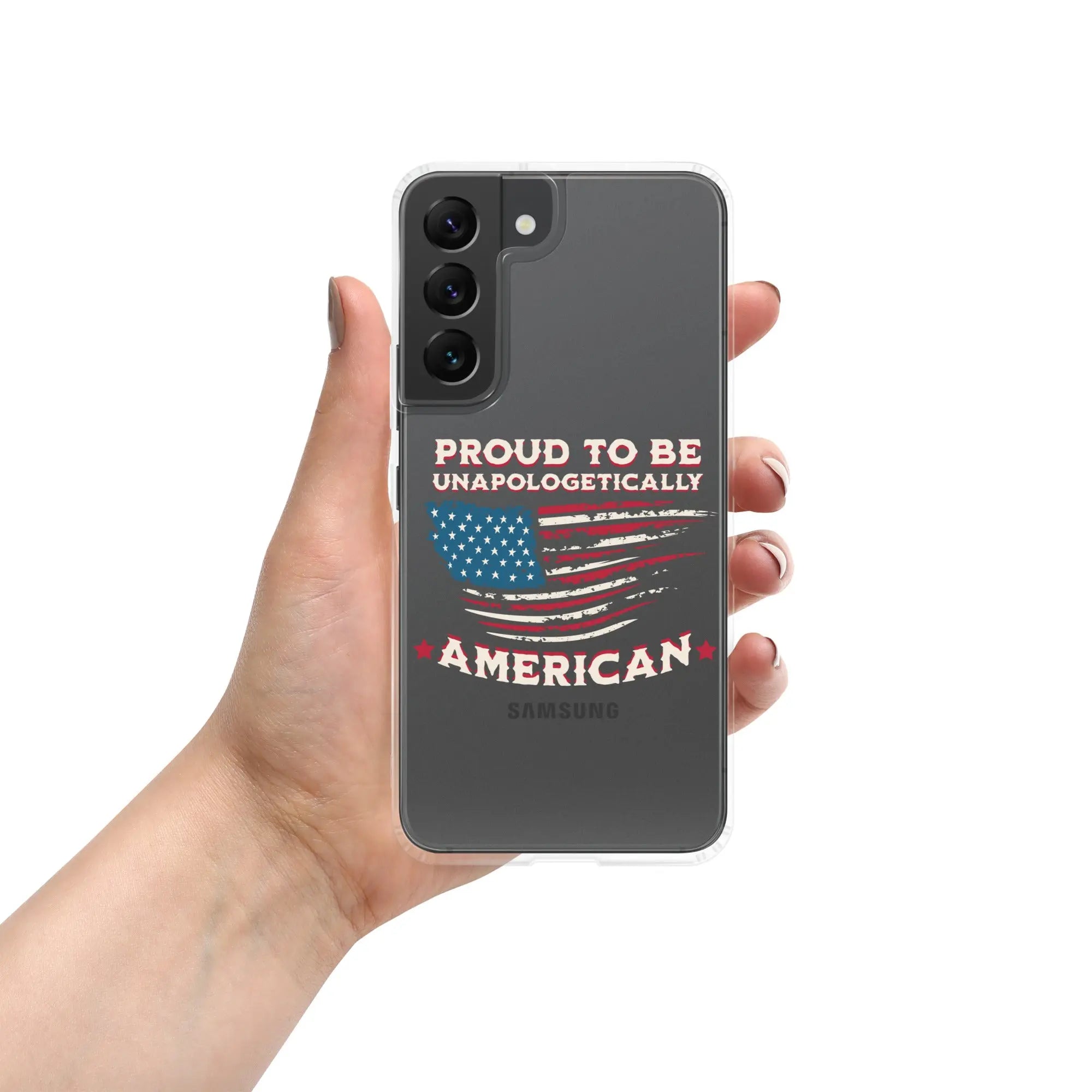 A patriotic Samsung phone clear case with an American flag and the text "Proud To Be Unapologetically American."
