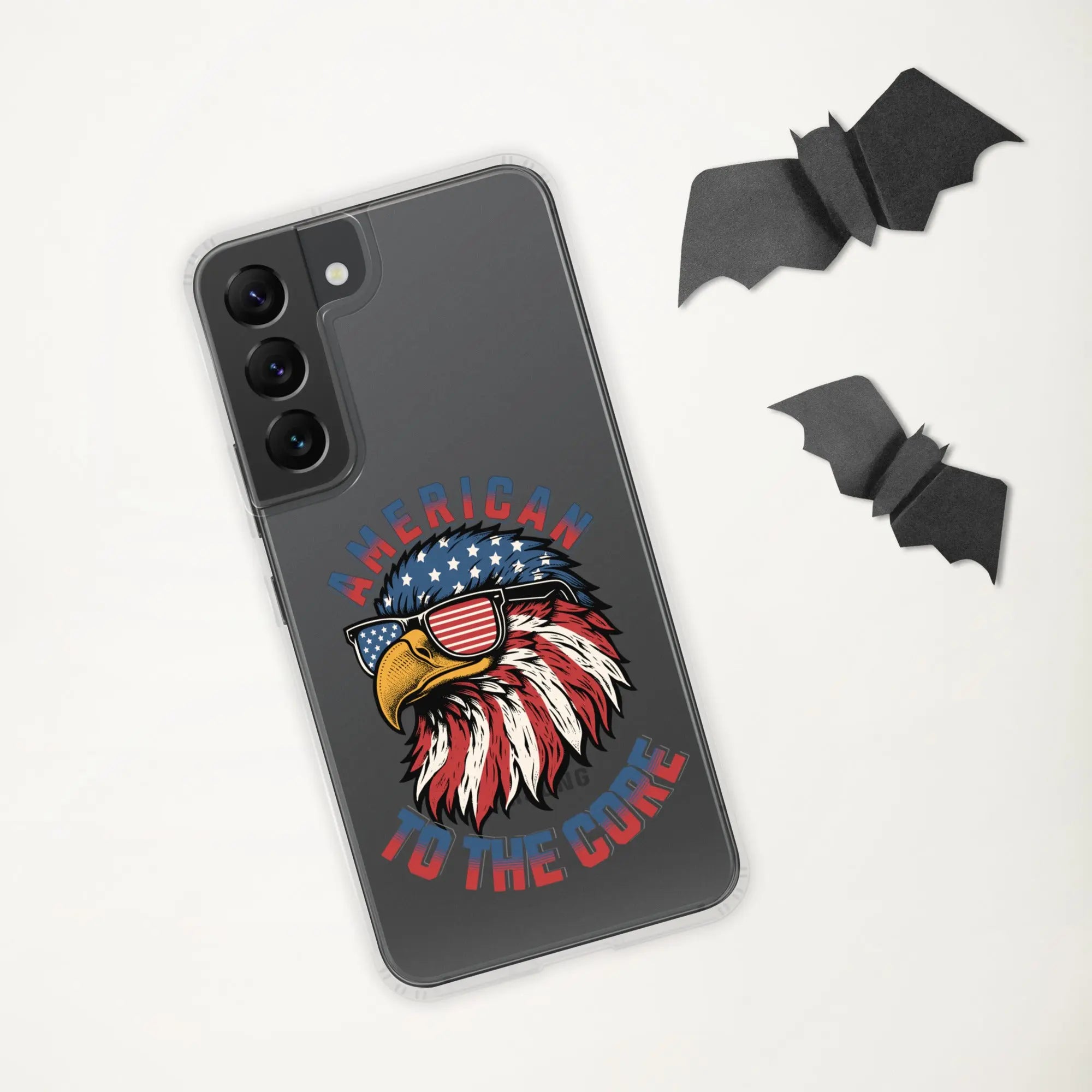 A patriotic Samsung phone clear case with an eagle head and the text "American To The Core."