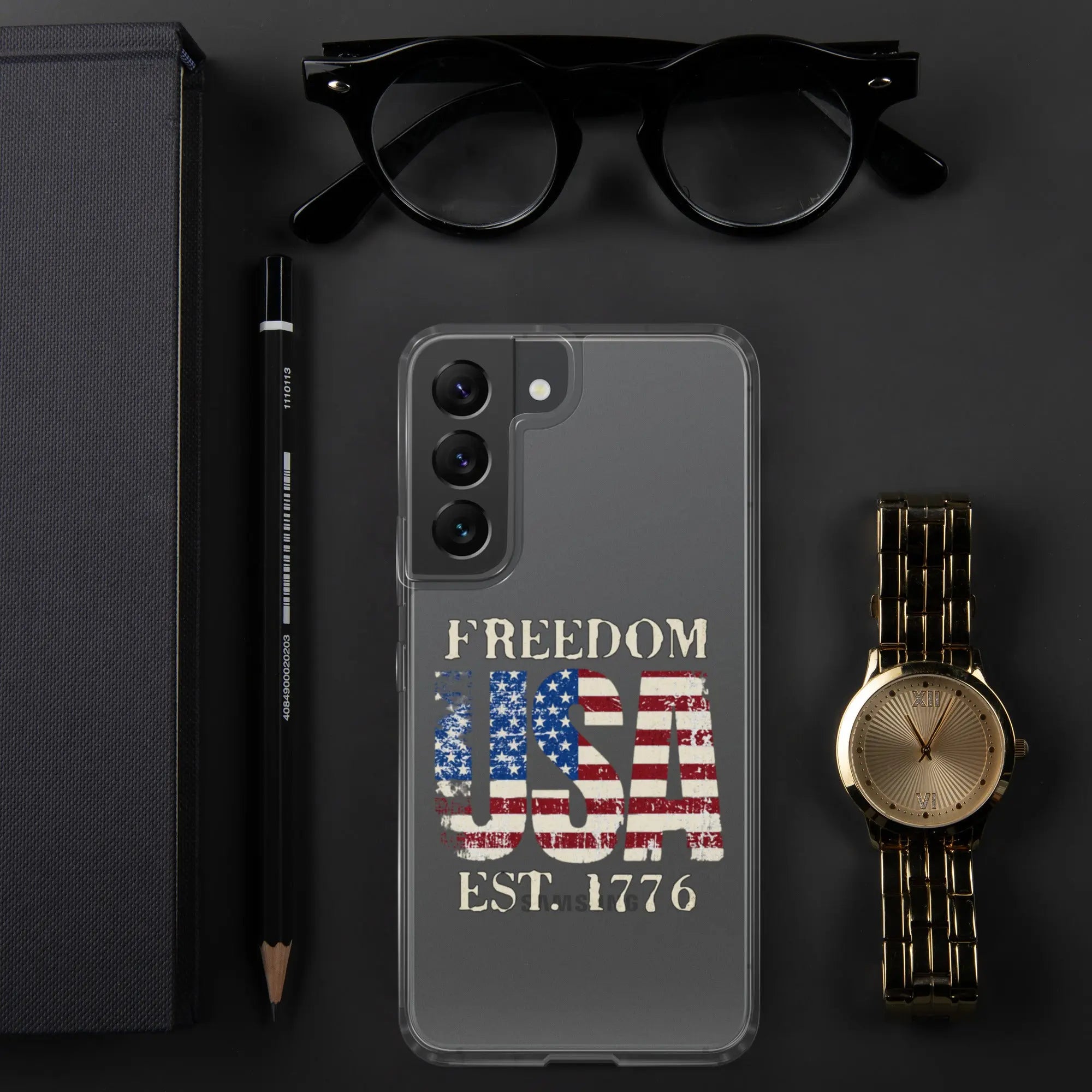 A patriotic Samsung clear phone case with the American flag in the shape of the USA and the text "Freedom est. 1776."