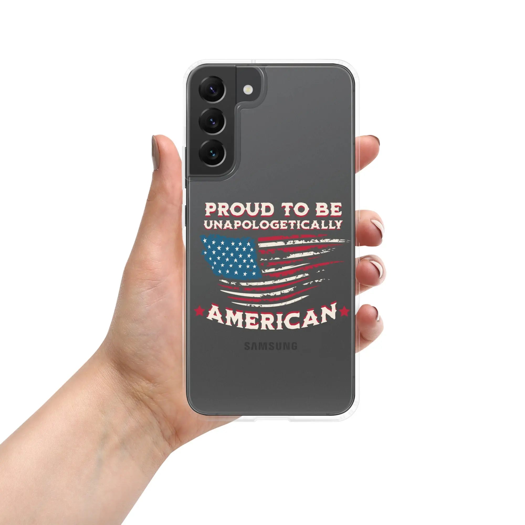 A patriotic Samsung phone clear case with an American flag and the text "Proud To Be Unapologetically American."