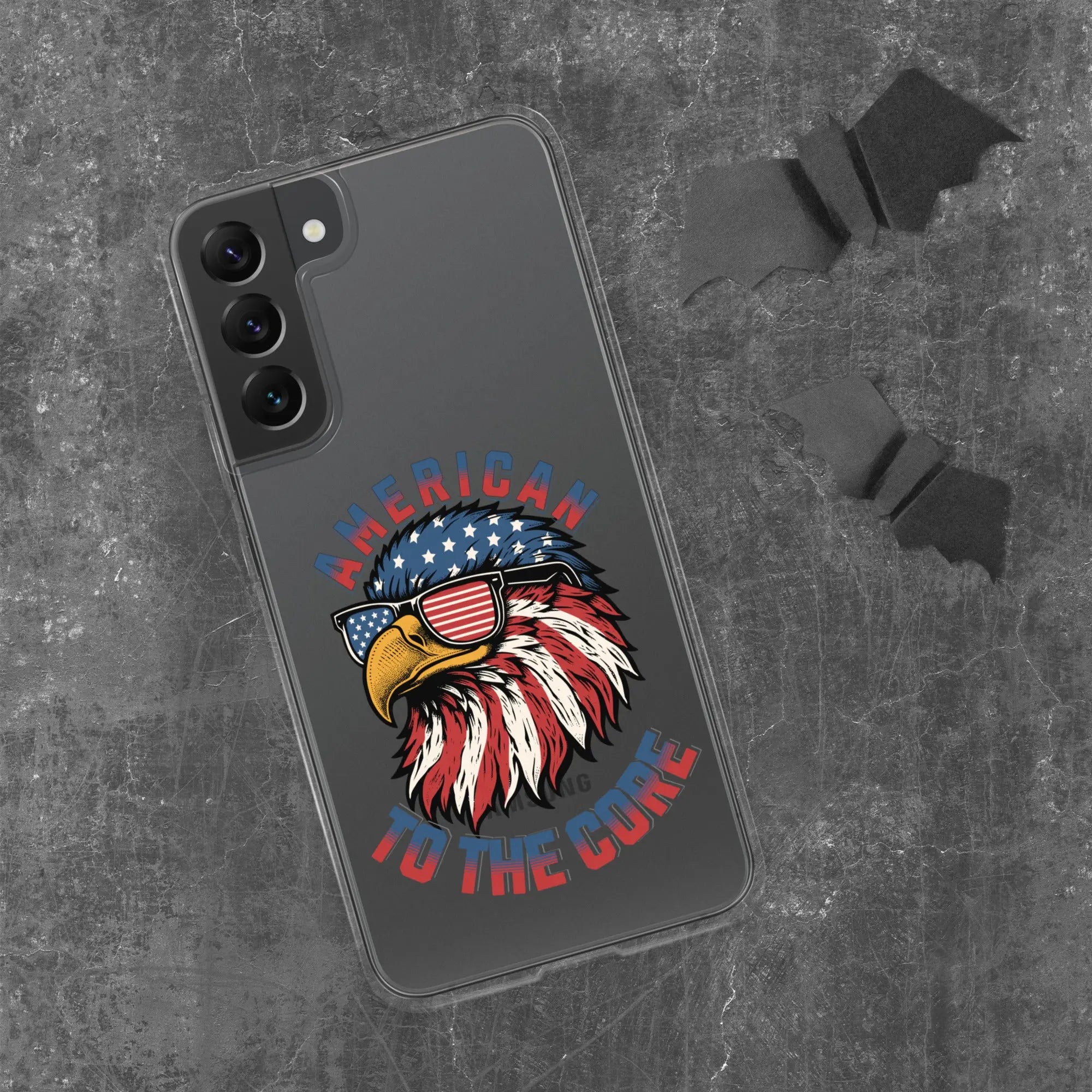 A patriotic Samsung phone clear case with an eagle head and the text "American To The Core."