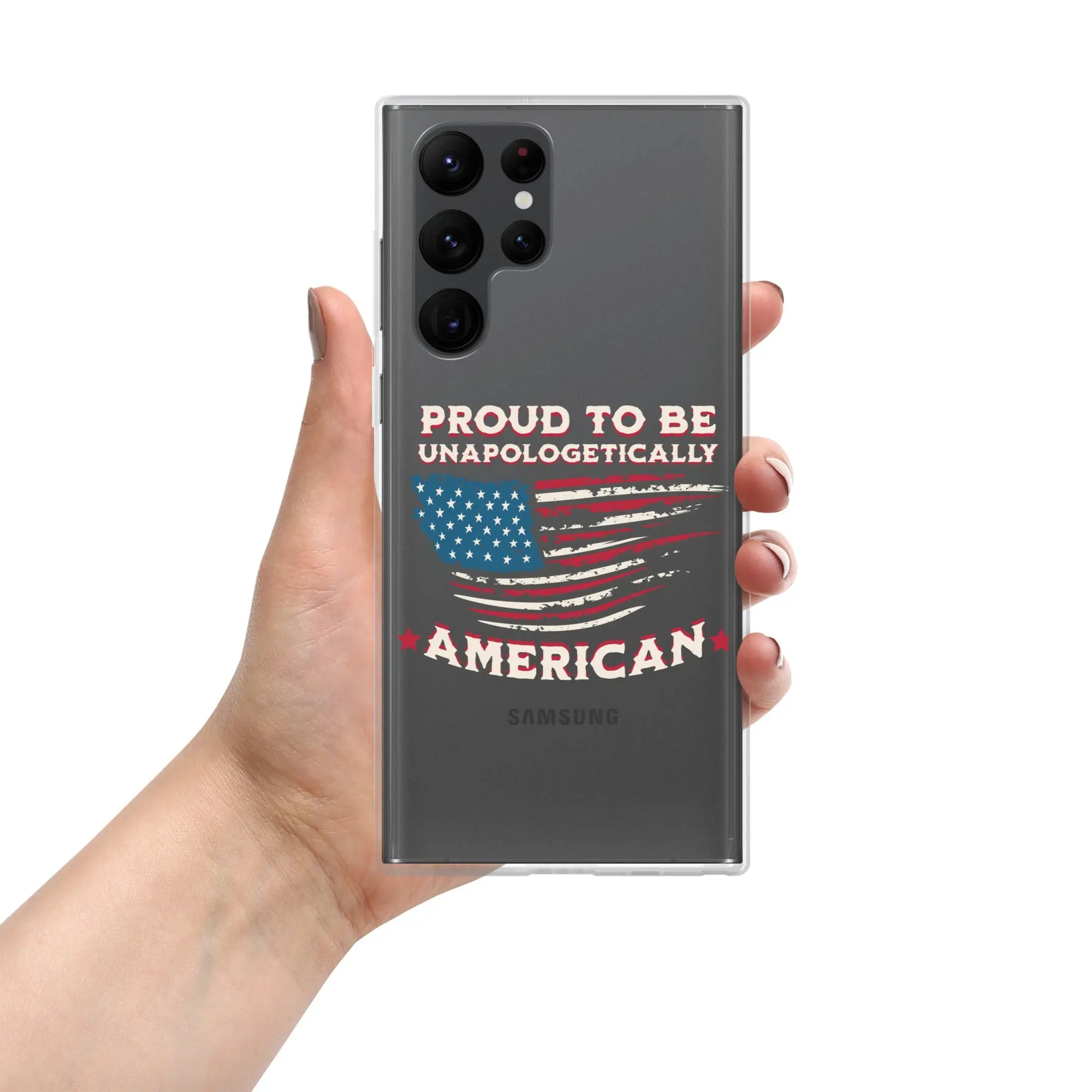 A patriotic Samsung phone clear case with an American flag and the text "Proud To Be Unapologetically American."