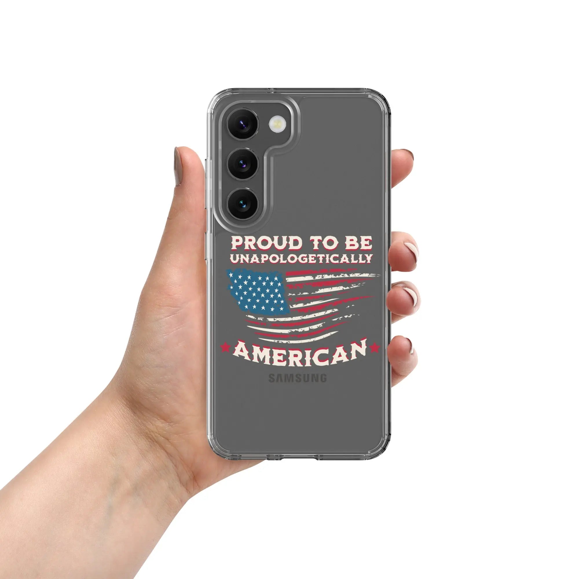 A patriotic Samsung phone clear case with an American flag and the text "Proud To Be Unapologetically American."
