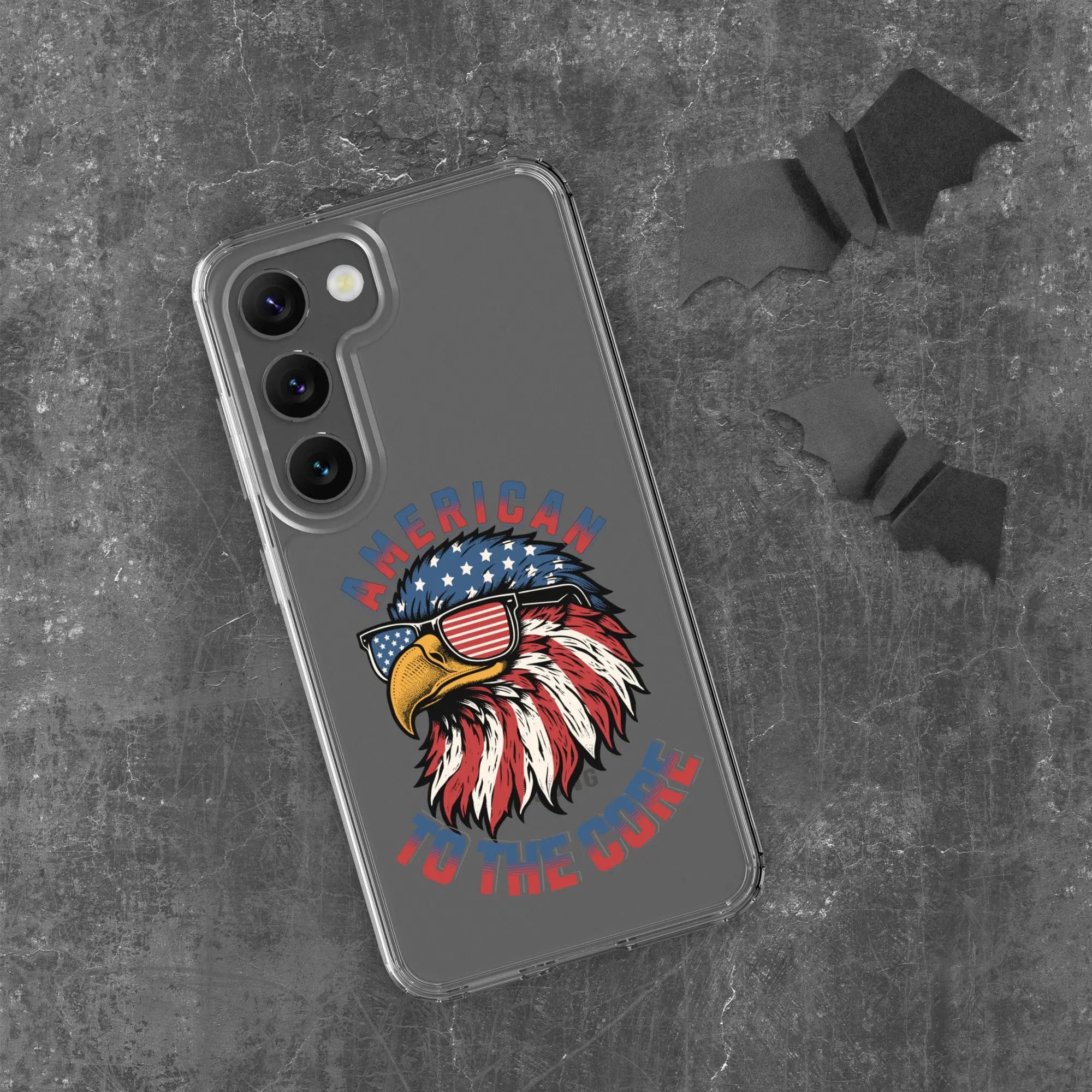 A patriotic Samsung phone clear case with an eagle head and the text "American To The Core."