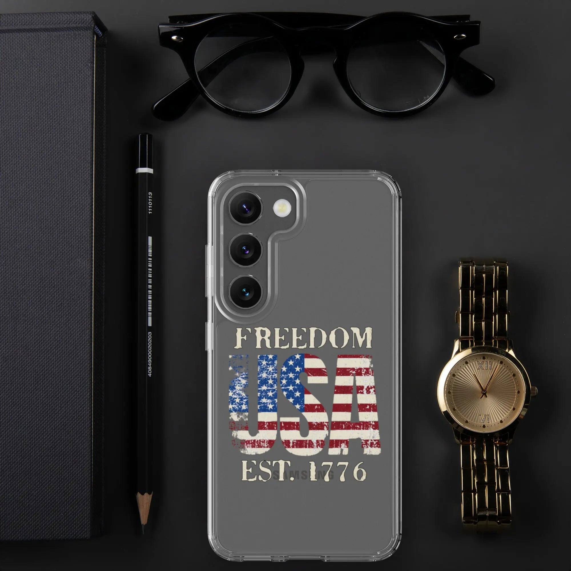 A patriotic Samsung clear phone case with the American flag in the shape of the USA and the text "Freedom est. 1776."