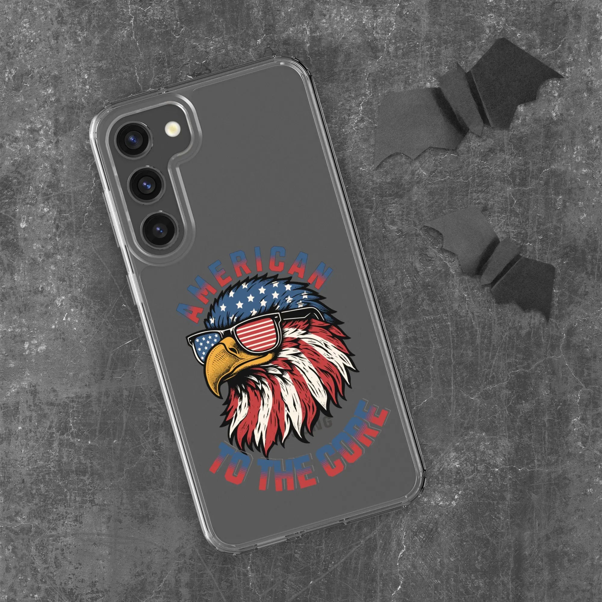 A patriotic Samsung phone clear case with an eagle head and the text "American To The Core."