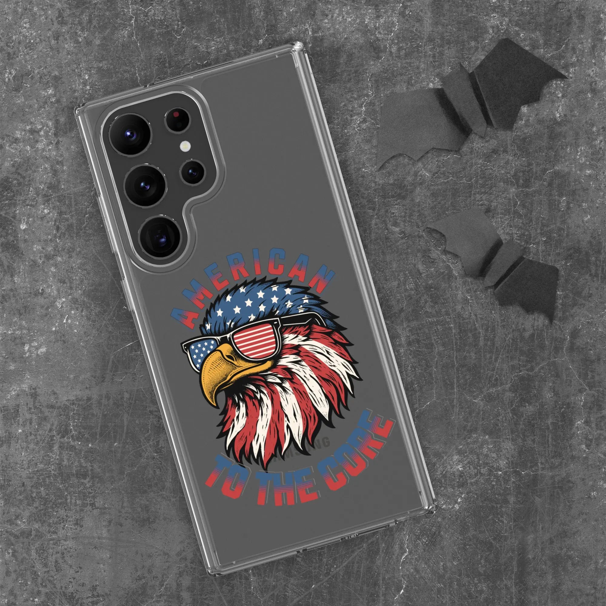 A patriotic Samsung phone clear case with an eagle head and the text "American To The Core."