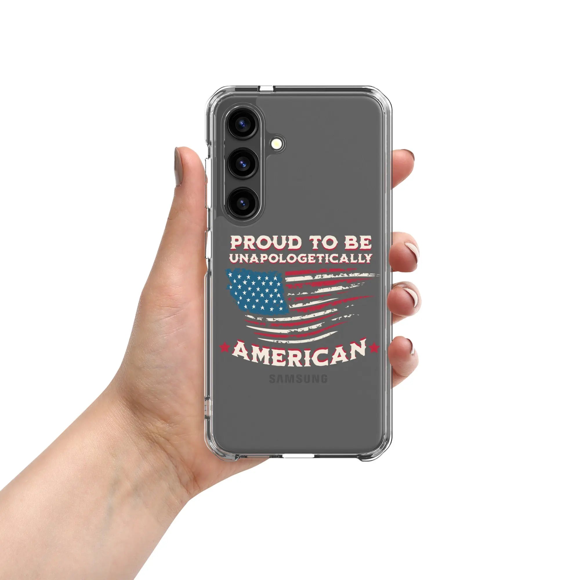 A patriotic Samsung phone clear case with an American flag and the text "Proud To Be Unapologetically American."