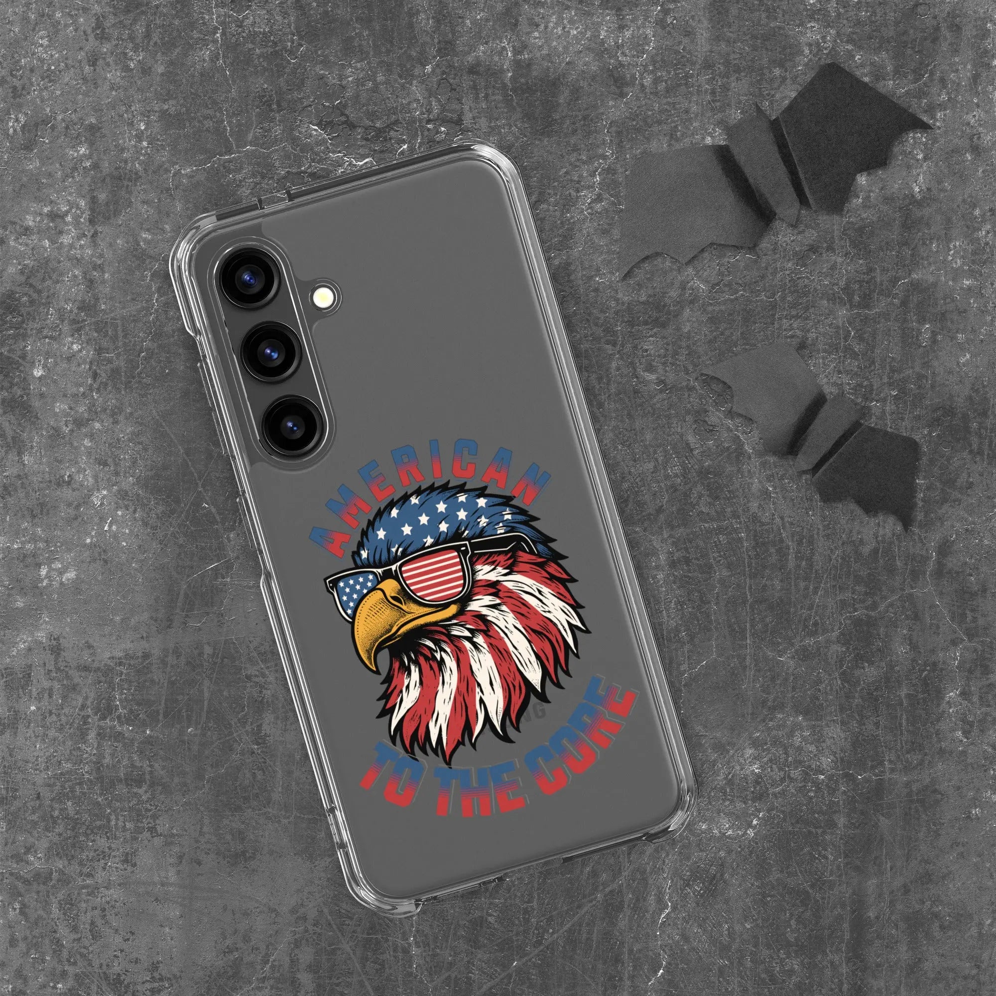 A patriotic Samsung phone clear case with an eagle head and the text "American To The Core."