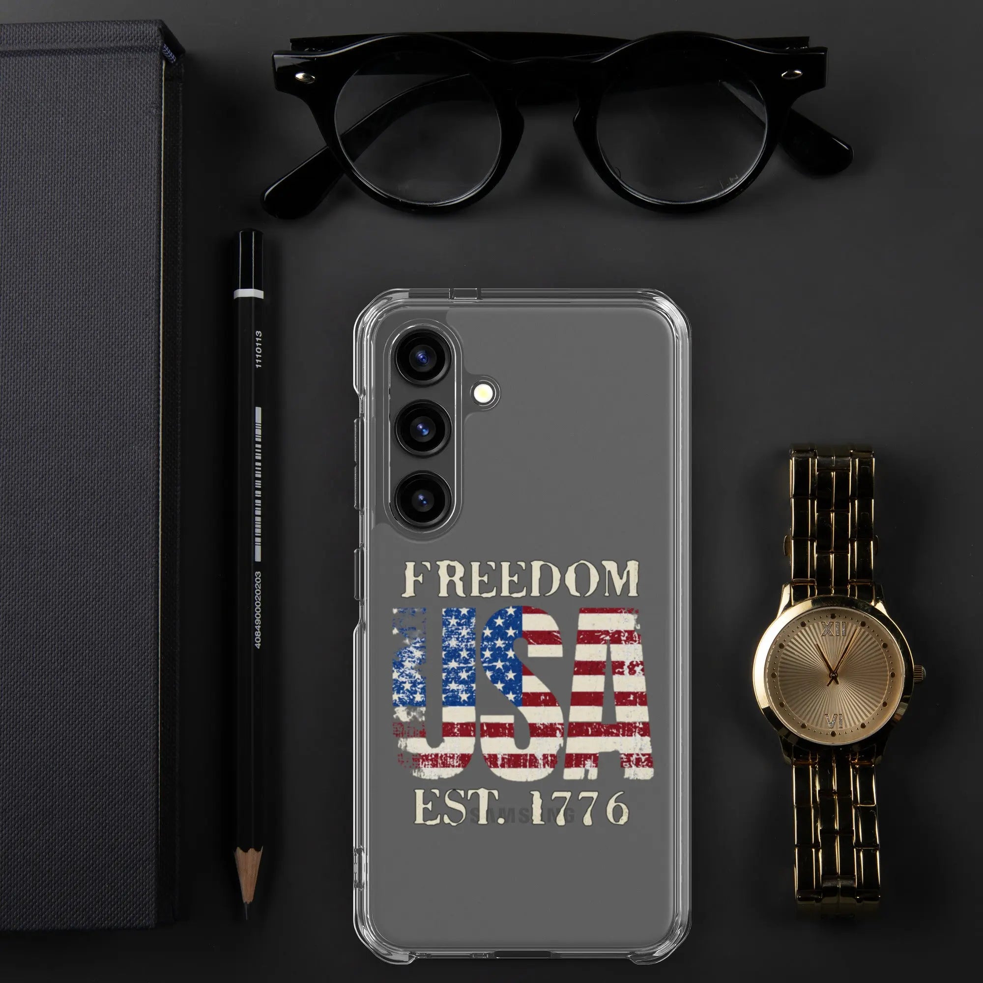A patriotic Samsung clear phone case with the American flag in the shape of the USA and the text "Freedom est. 1776."