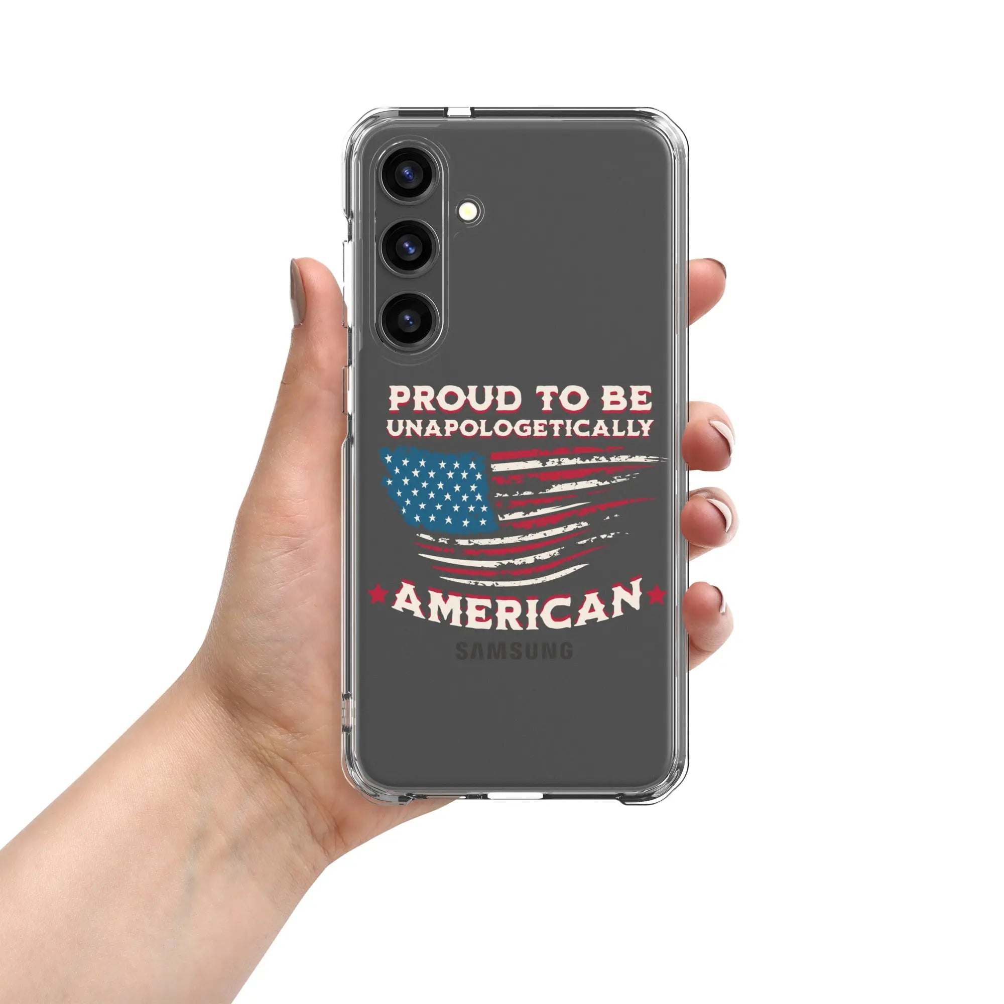 A patriotic Samsung phone clear case with an American flag and the text "Proud To Be Unapologetically American."
