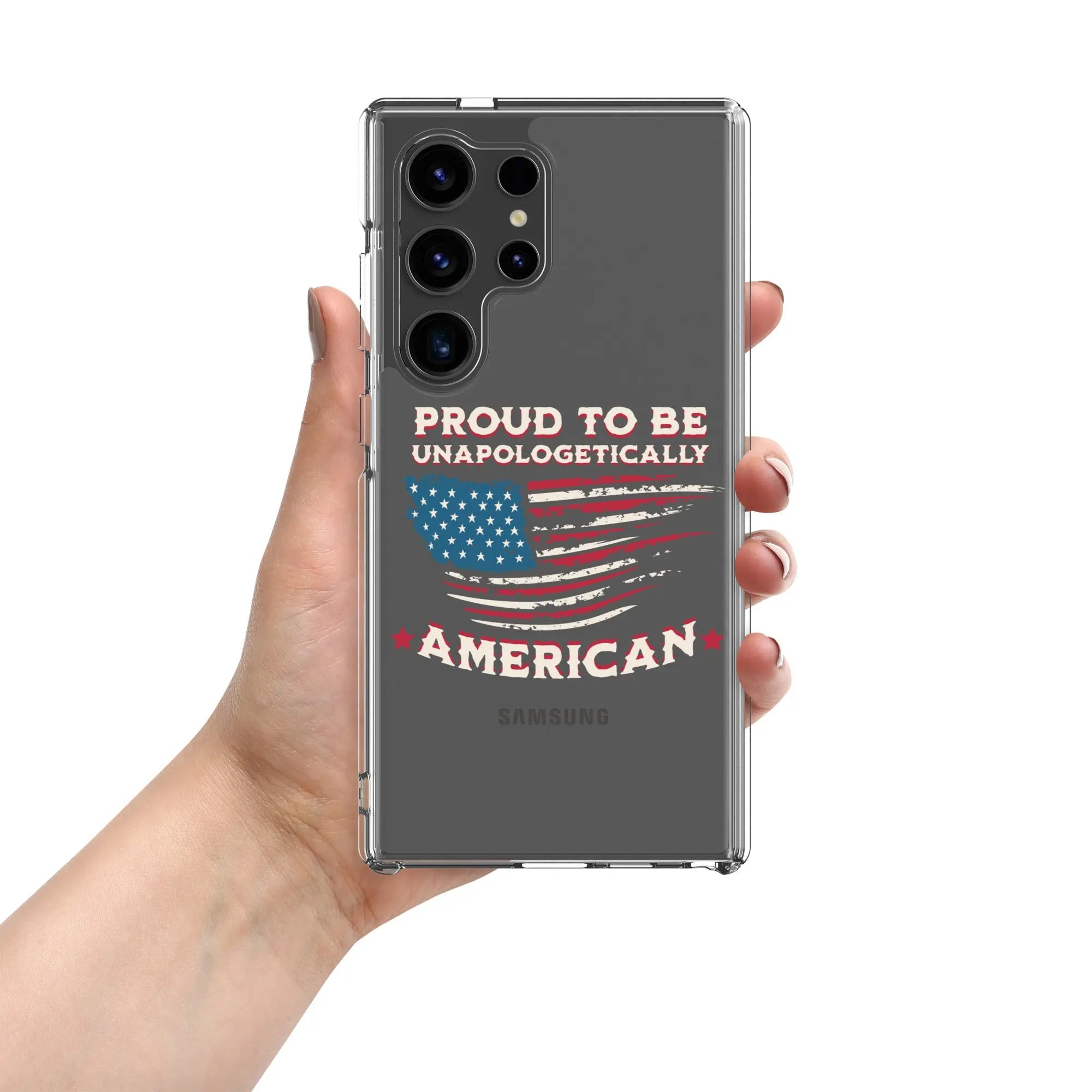 A patriotic Samsung phone clear case with an American flag and the text "Proud To Be Unapologetically American."