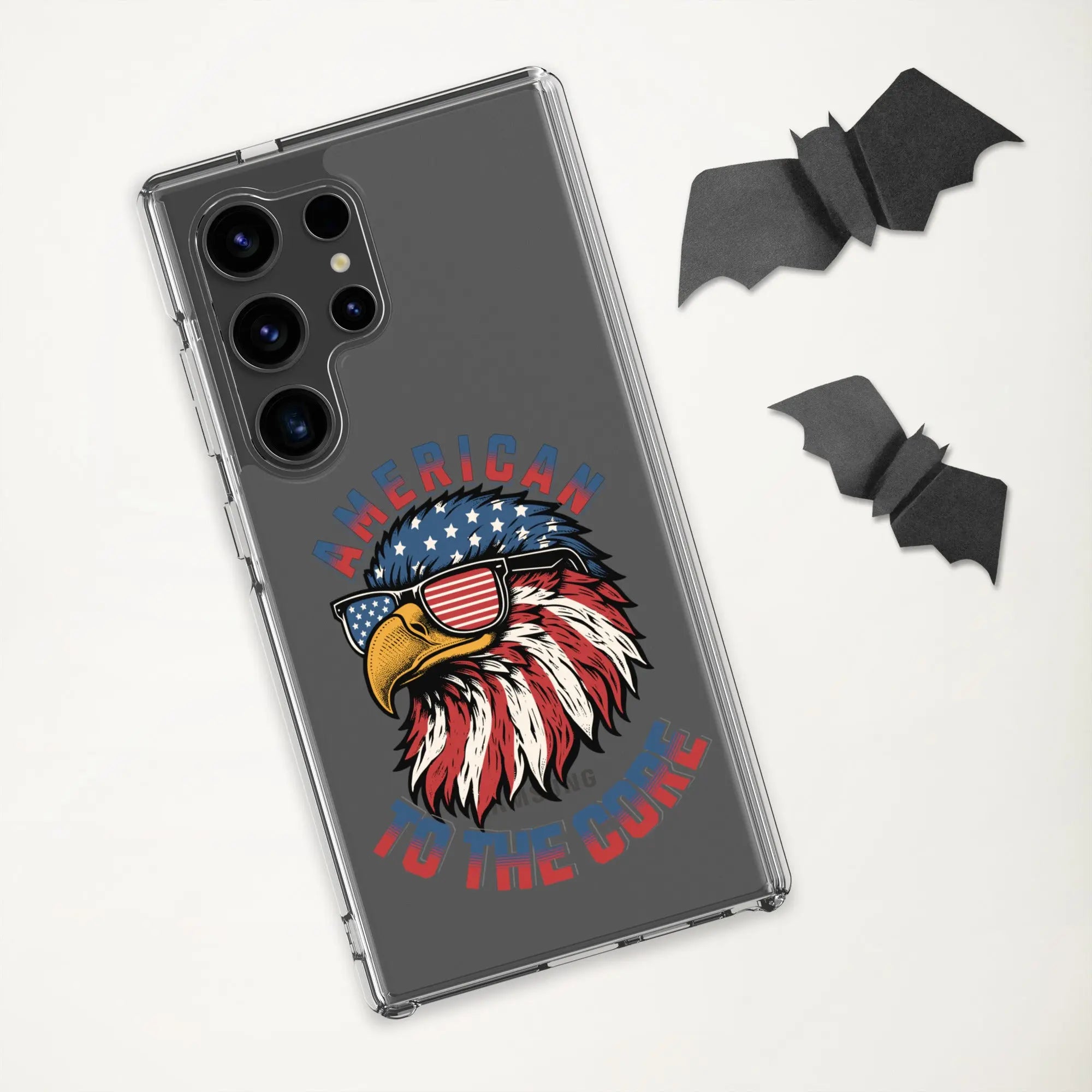 A patriotic Samsung phone clear case with an eagle head and the text "American To The Core."