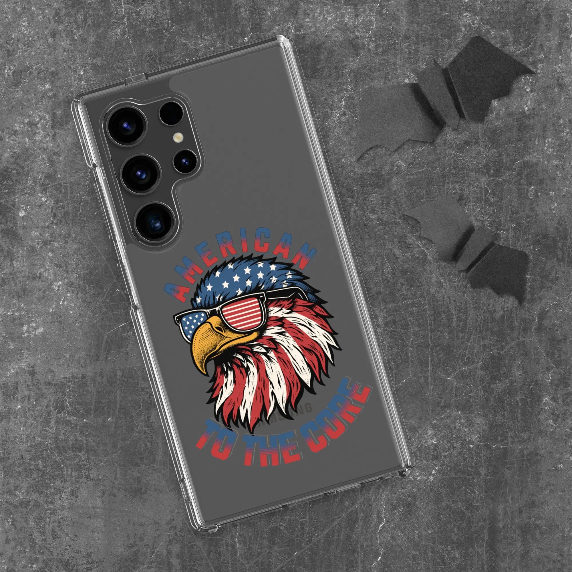 A patriotic Samsung phone clear case with an eagle head and the text "American To The Core."