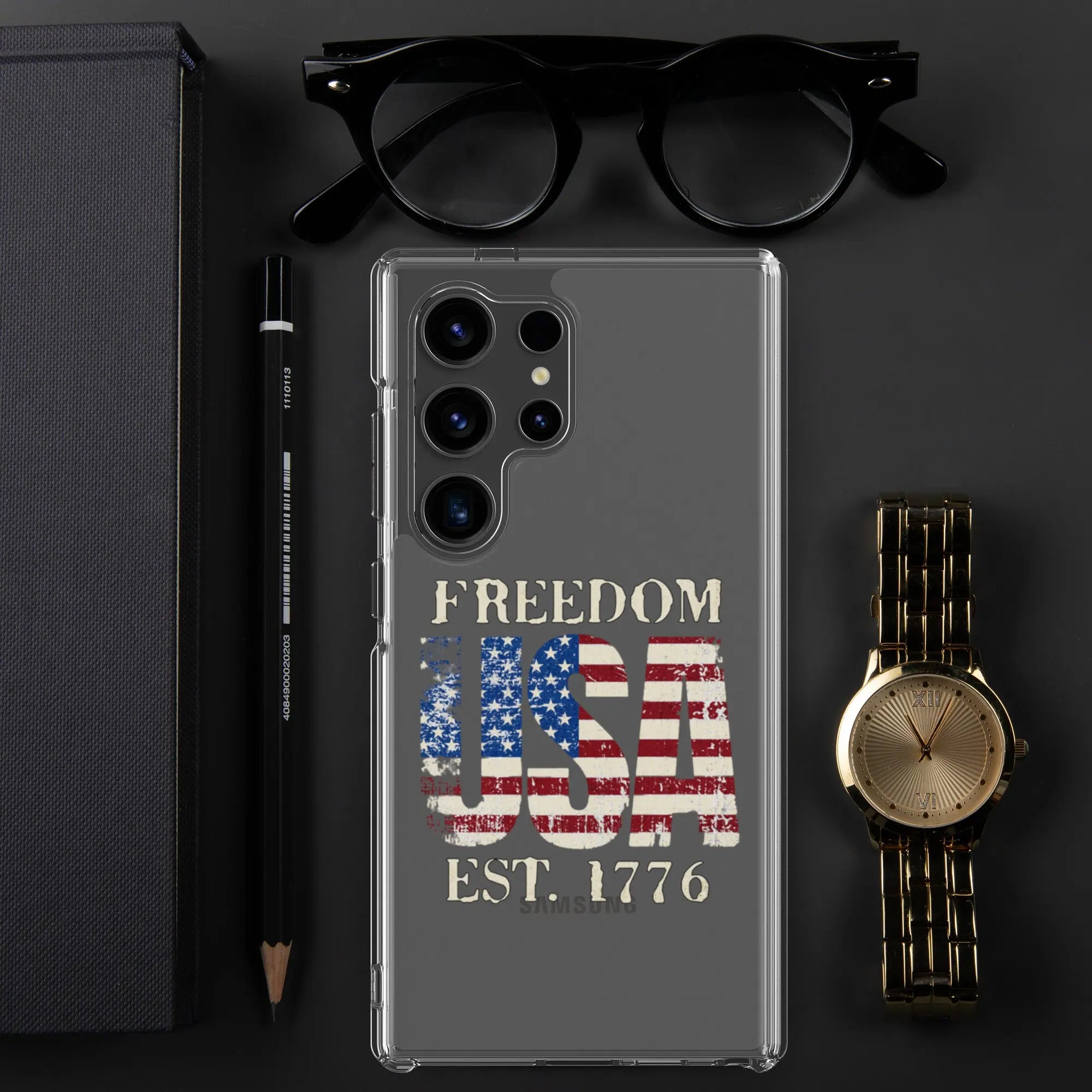A patriotic Samsung clear phone case with the American flag in the shape of the USA and the text "Freedom est. 1776."