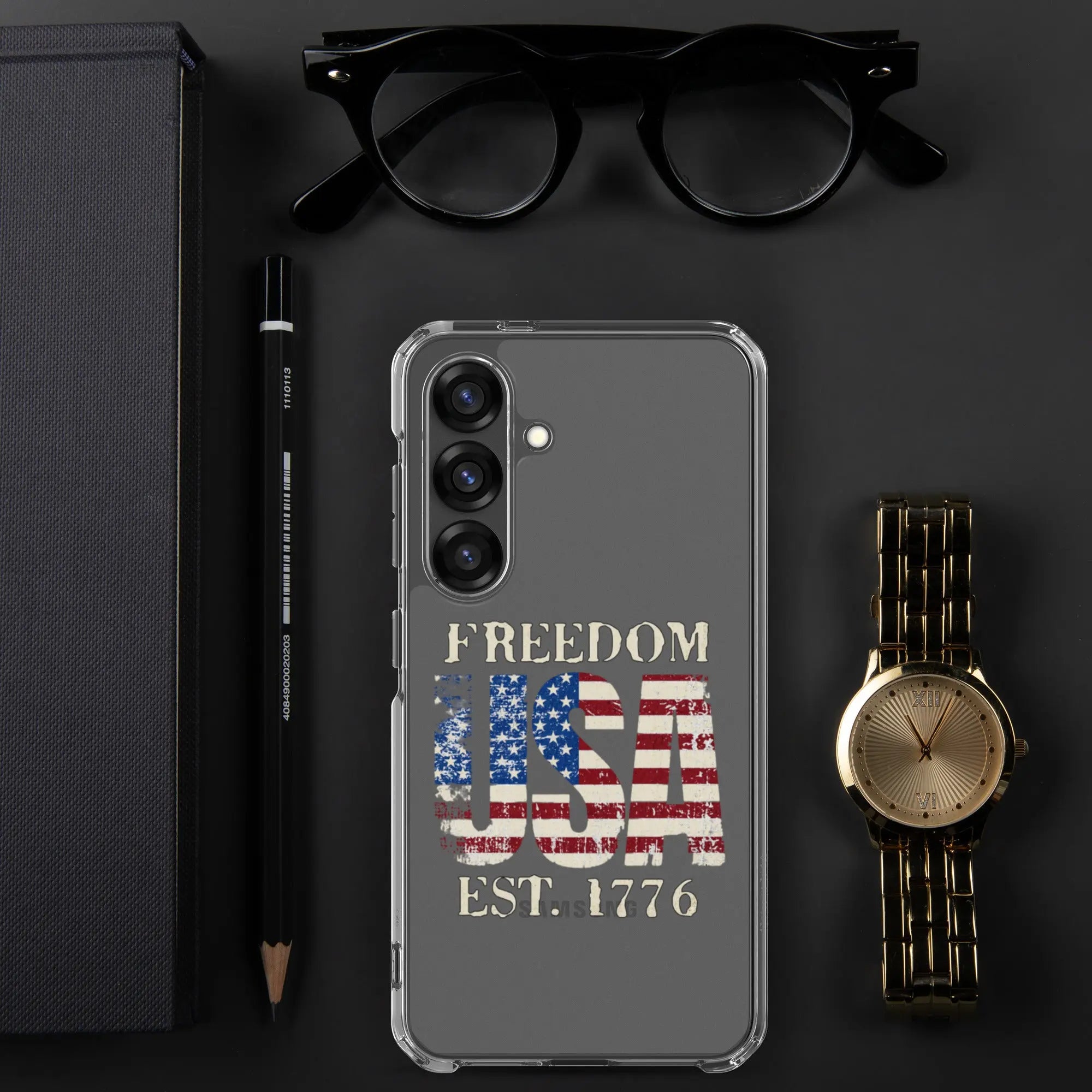 A patriotic Samsung clear phone case with the American flag in the shape of the USA and the text "Freedom est. 1776."