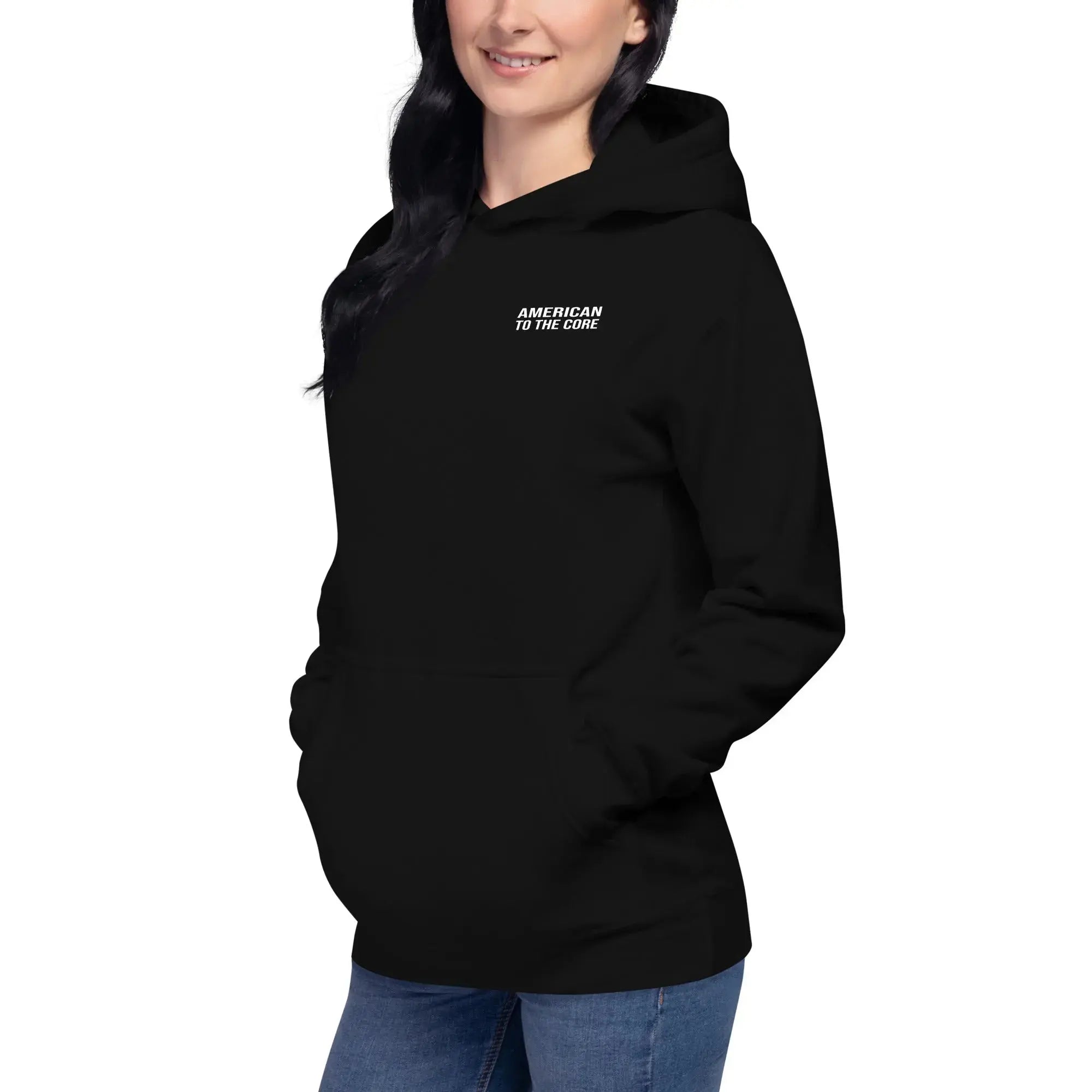 A women's black patriotic hoodie with the text "American To The Core."