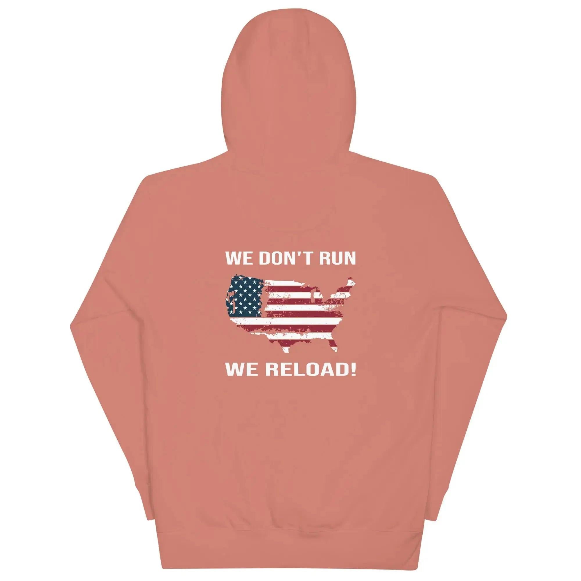 Back of a women's dusty rose patriotic hoodie with the silhouette of America with the flag on it. And the text "We Don't Run, We Reload." 