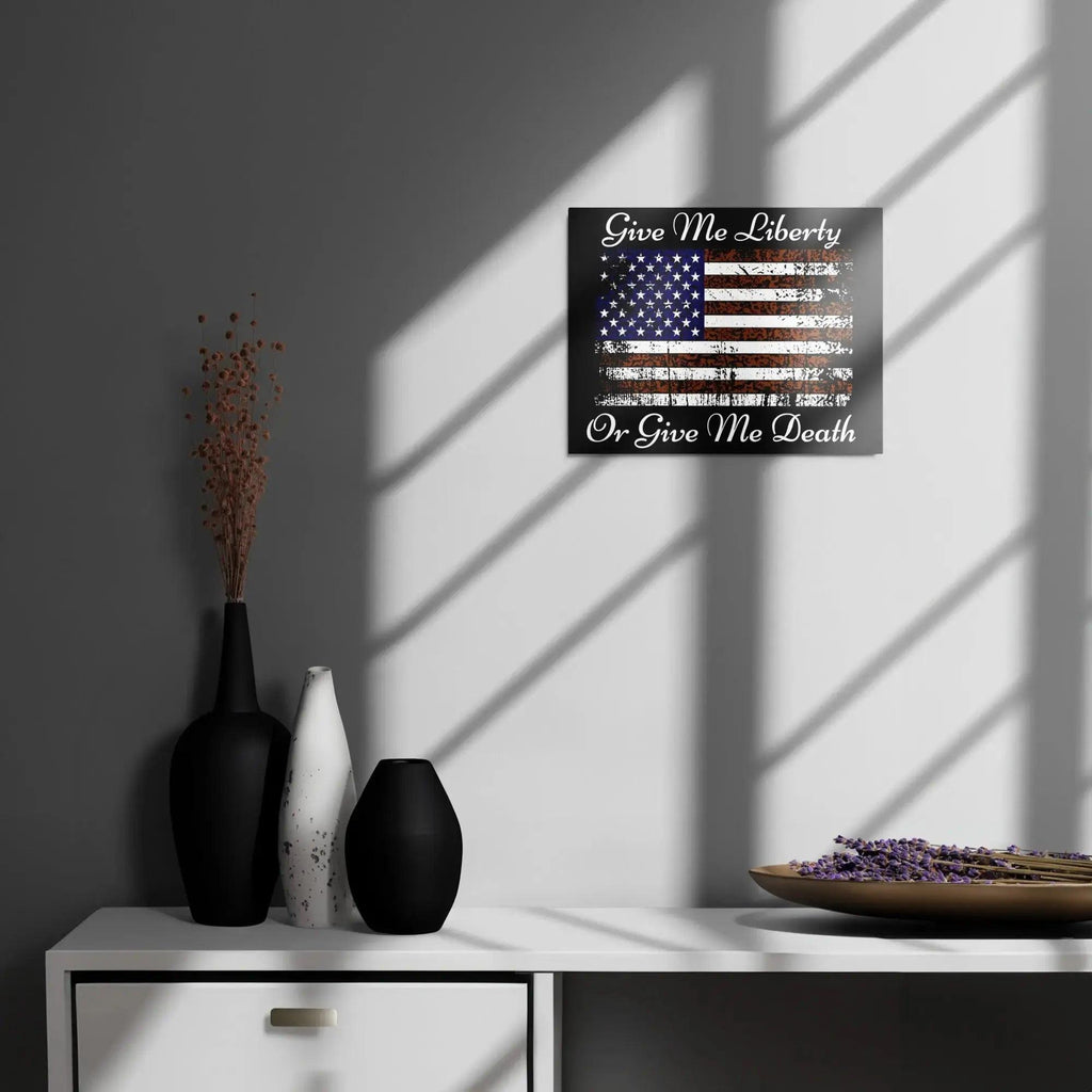 A patriotic metal sign hangs on the wall with the American flag and the text "Give Me Liberty or Give Me Death."
