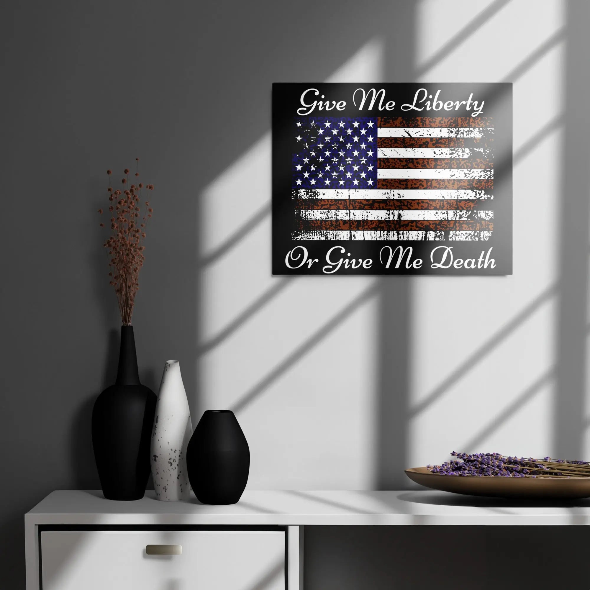 A patriotic metal sign hangs on the wall with the American flag and the text "Give Me Liberty or Give Me Death."