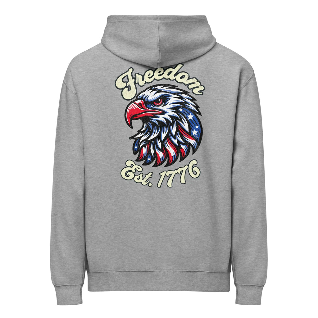 Back of man wearing a carbon grey patriotic hoodie with an eagle head and "Freedom Est. 1776" text.