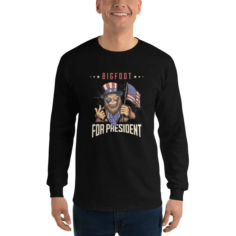 A man wearing a patriotic black long-sleeved shirt with Bigfoot holding an American flag and the text "Bigfoot for president."