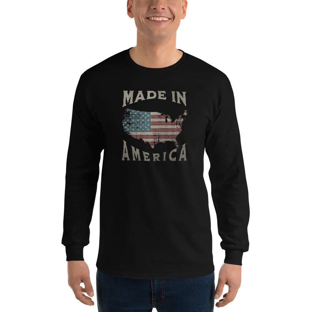 A man wearing a patriotic black long-sleeved shirt with the American flag in the shape of America and the text "Made in America."
