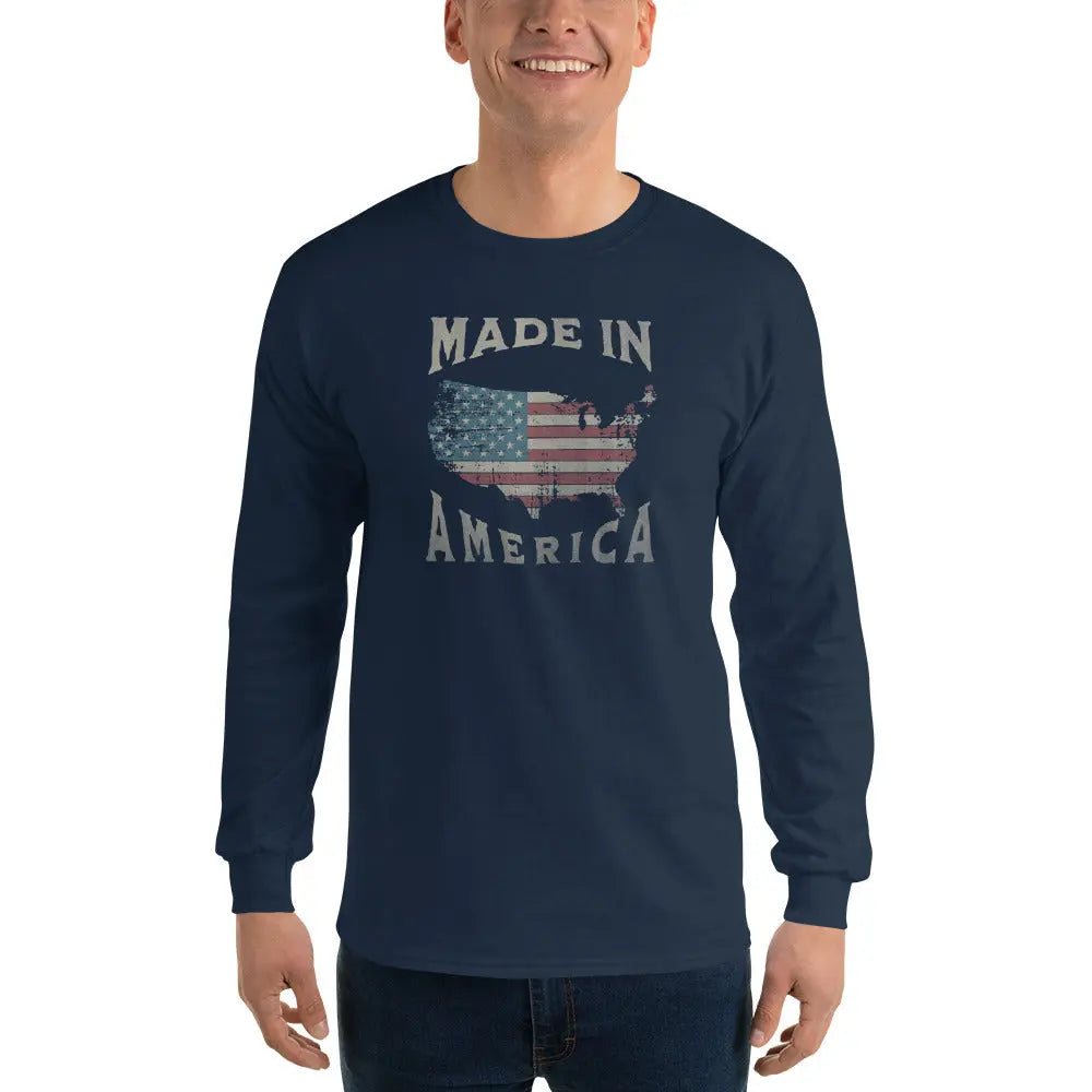 A man wearing a patriotic navy blue long-sleeved shirt with the American flag in the shape of America and the text "Made in America."