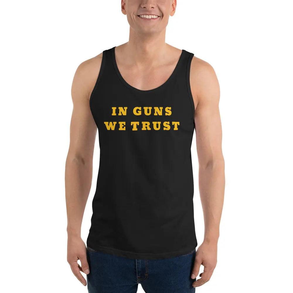 A man wearing a black patriotic tank top with the text "In Guns We Trust" 