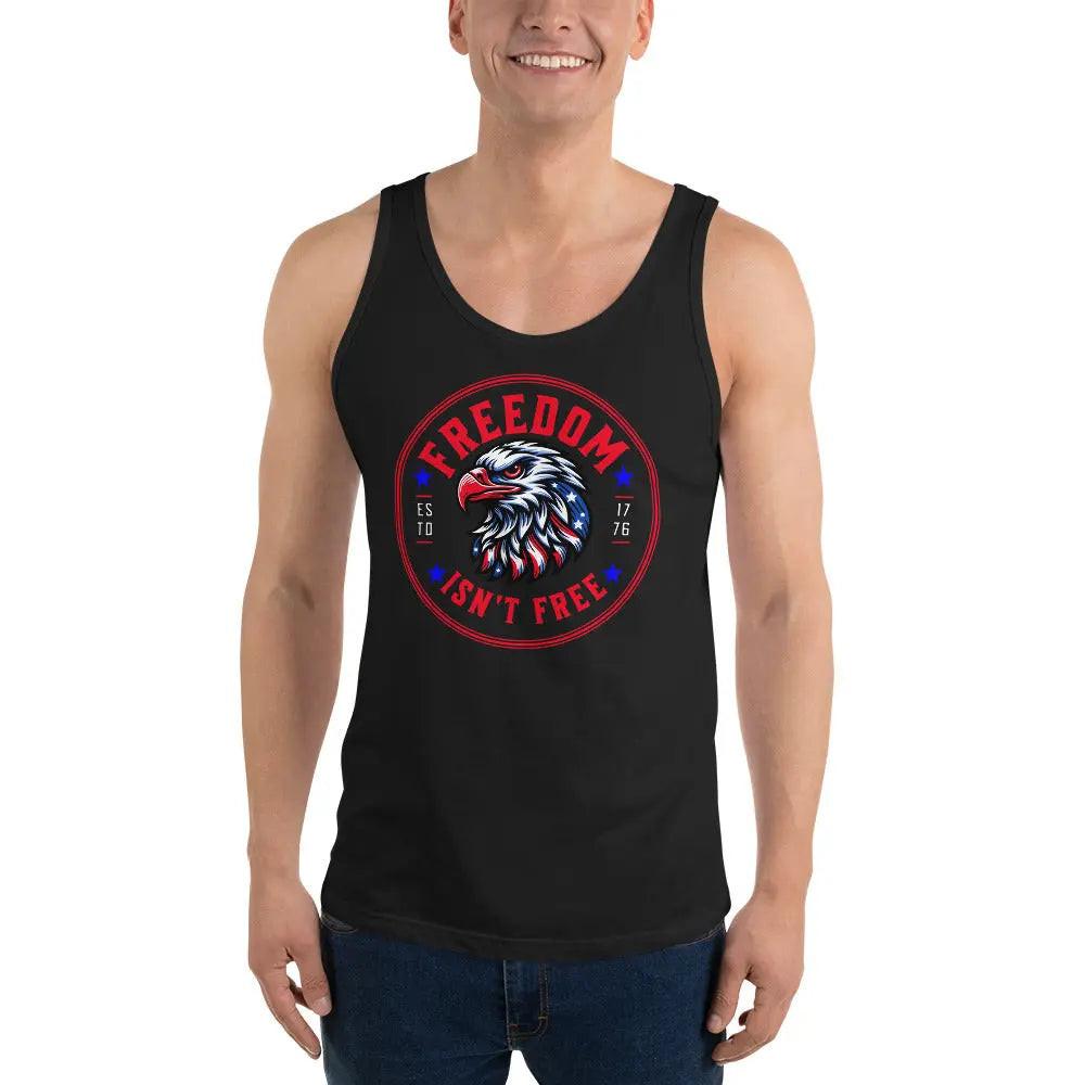 A man wearing a black patriotic tank top with an eagle head in red, white, and blue. With the text "Freedom isn't free."