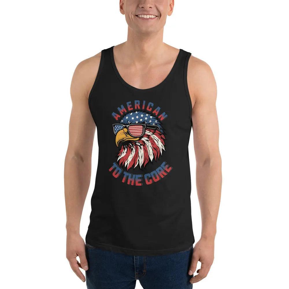 A man wearing a black patriotic tank top with an American flag-themed eagle head with the text "American To the Core."