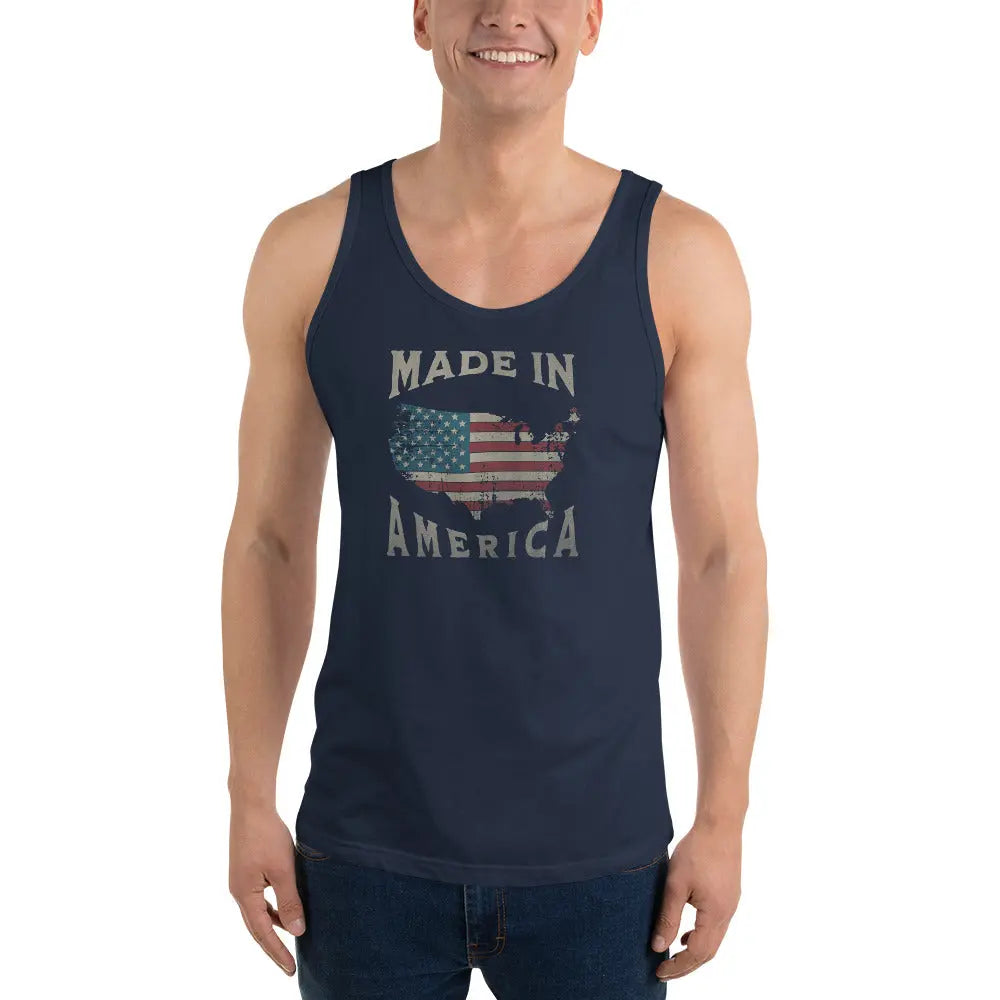 A man wearing a navy patriotic tank top with the American flag in the shape of America and the text "Made In America."