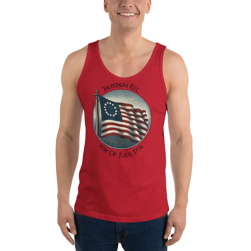 A man wearing a red patriotic tank top with the American flag and the text "Freedom Est. 4th of July, 1776."