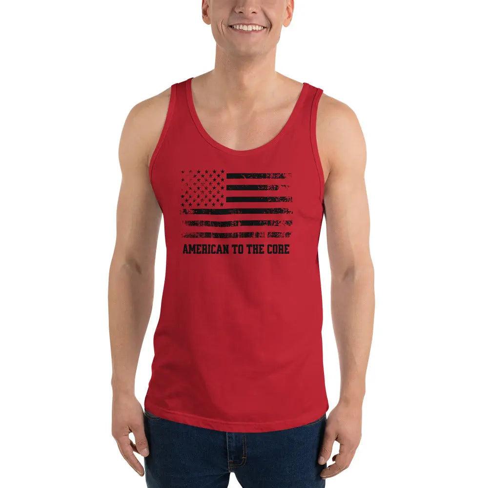 A man wearing a red patriotic tank top with the American flag and the text "American To The Core."
