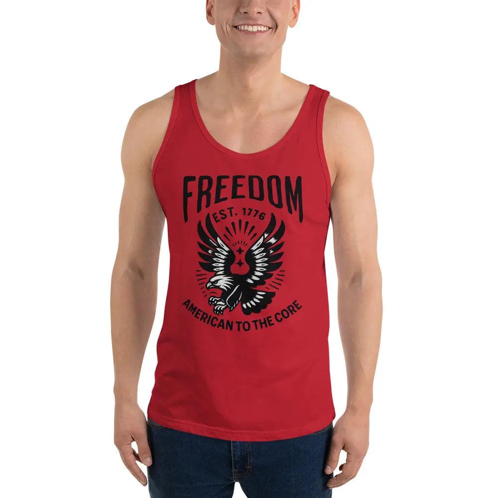 A man wearing a black patriotic tank top with a flying eagle and the text "Freedom est. 1776 and American to the core."