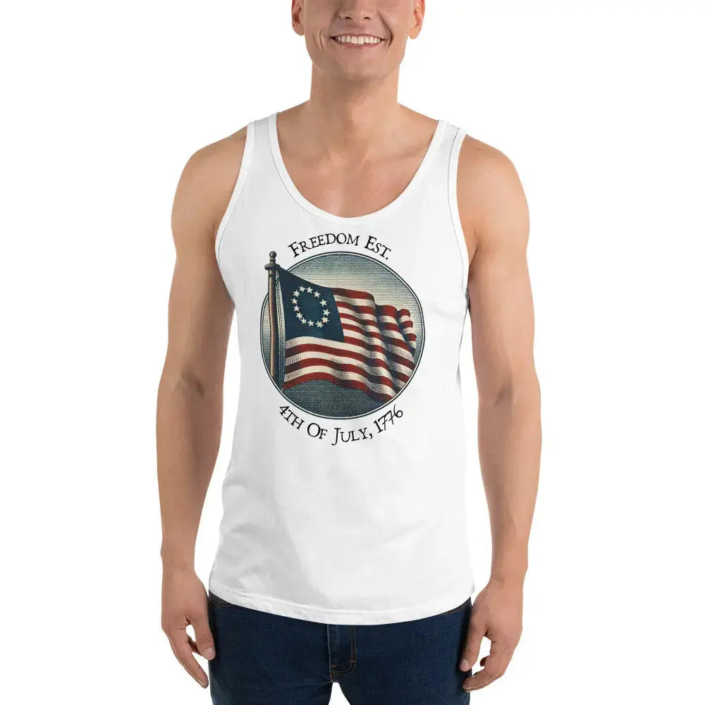 A man wearing a white patriotic tank top with the American flag and the text "Freedom Est. 4th of July, 1776."