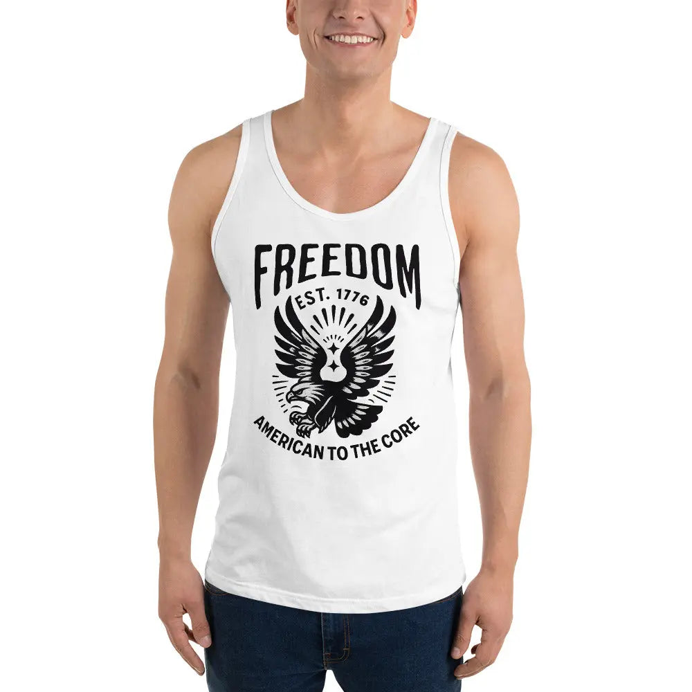 A man wearing a white patriotic tank top with a flying eagle and the text "Freedom est. 1776 and American to the core."