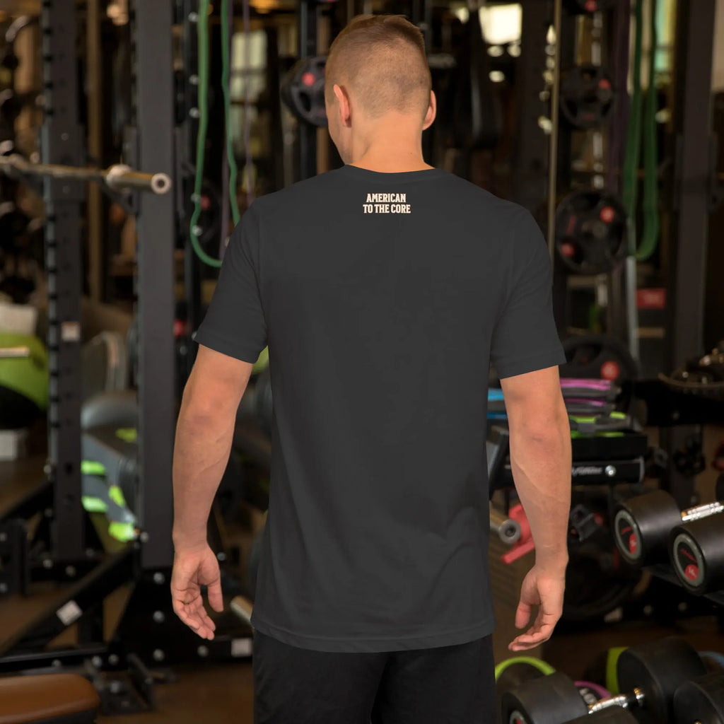 Back of man wearing a dark grey patriotic t-shirt with "America to the core" text