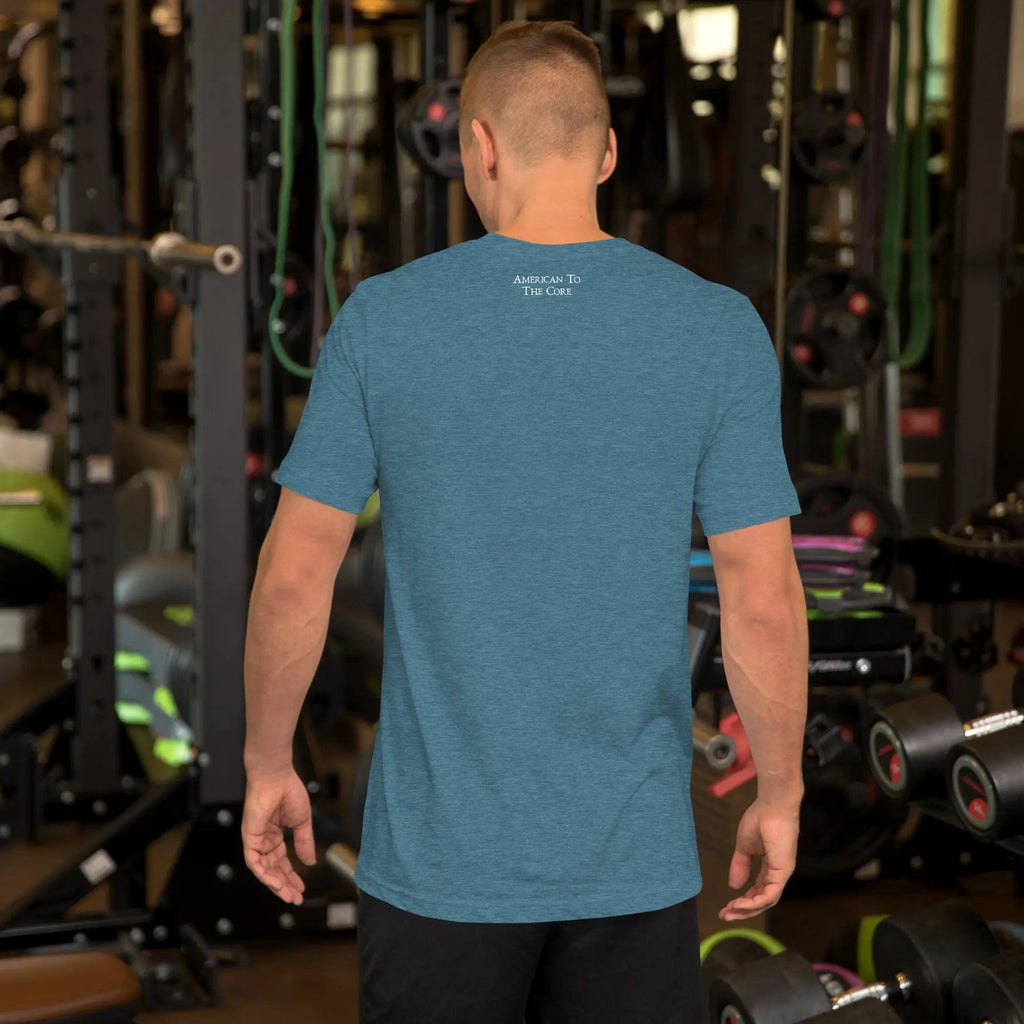 Back of a man wearing a heather deep teal patriotic t-shirt. With the text "American To The Core." 